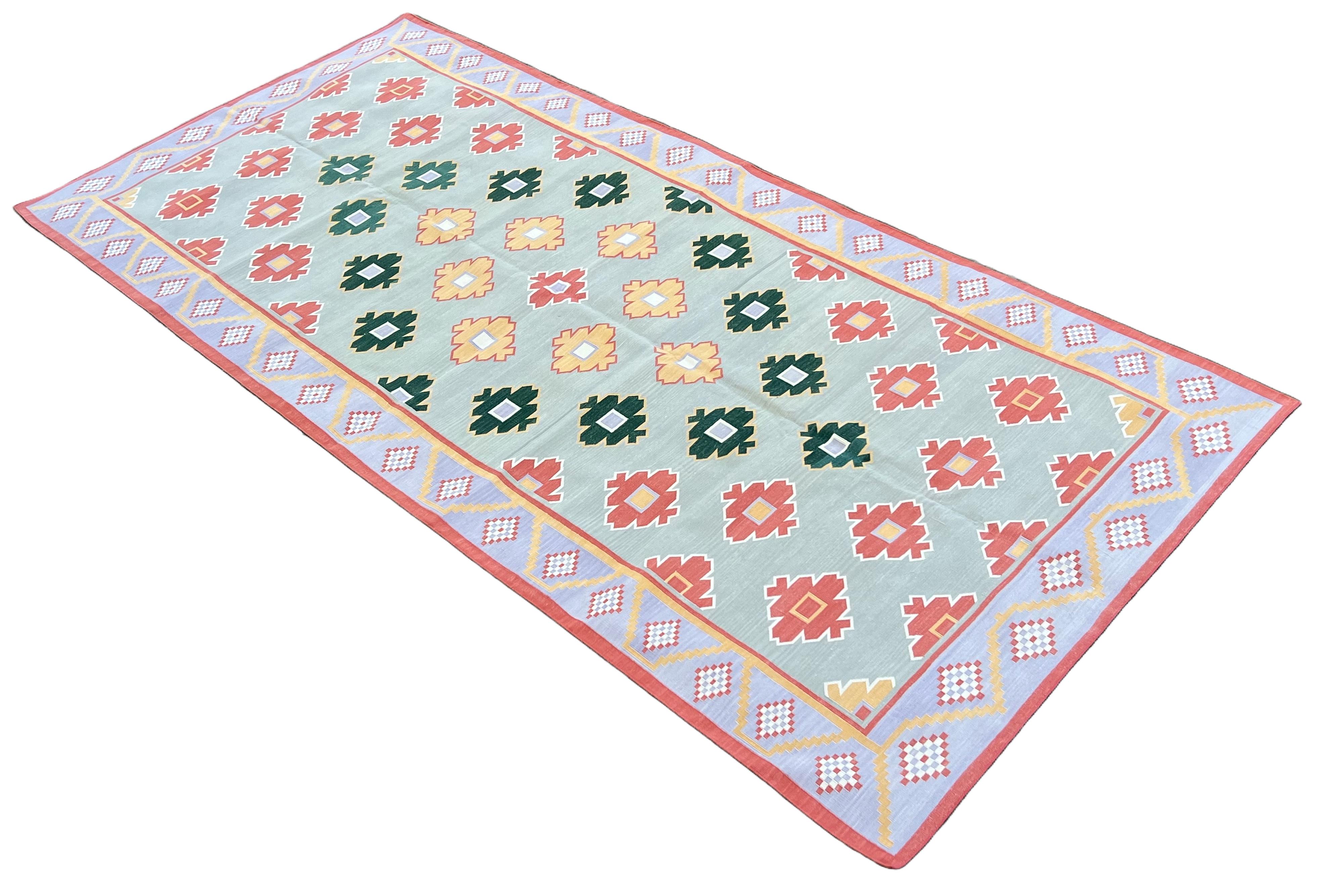 Cotton Vegetable Dyed Reversible Grey, Coral, Lavender, Green & Mustard Geometric Patterned Star 
Indian Rug - 6'x12'
These special flat-weave dhurries are hand-woven with 15 ply 100% cotton yarn. Due to the special manufacturing techniques used to