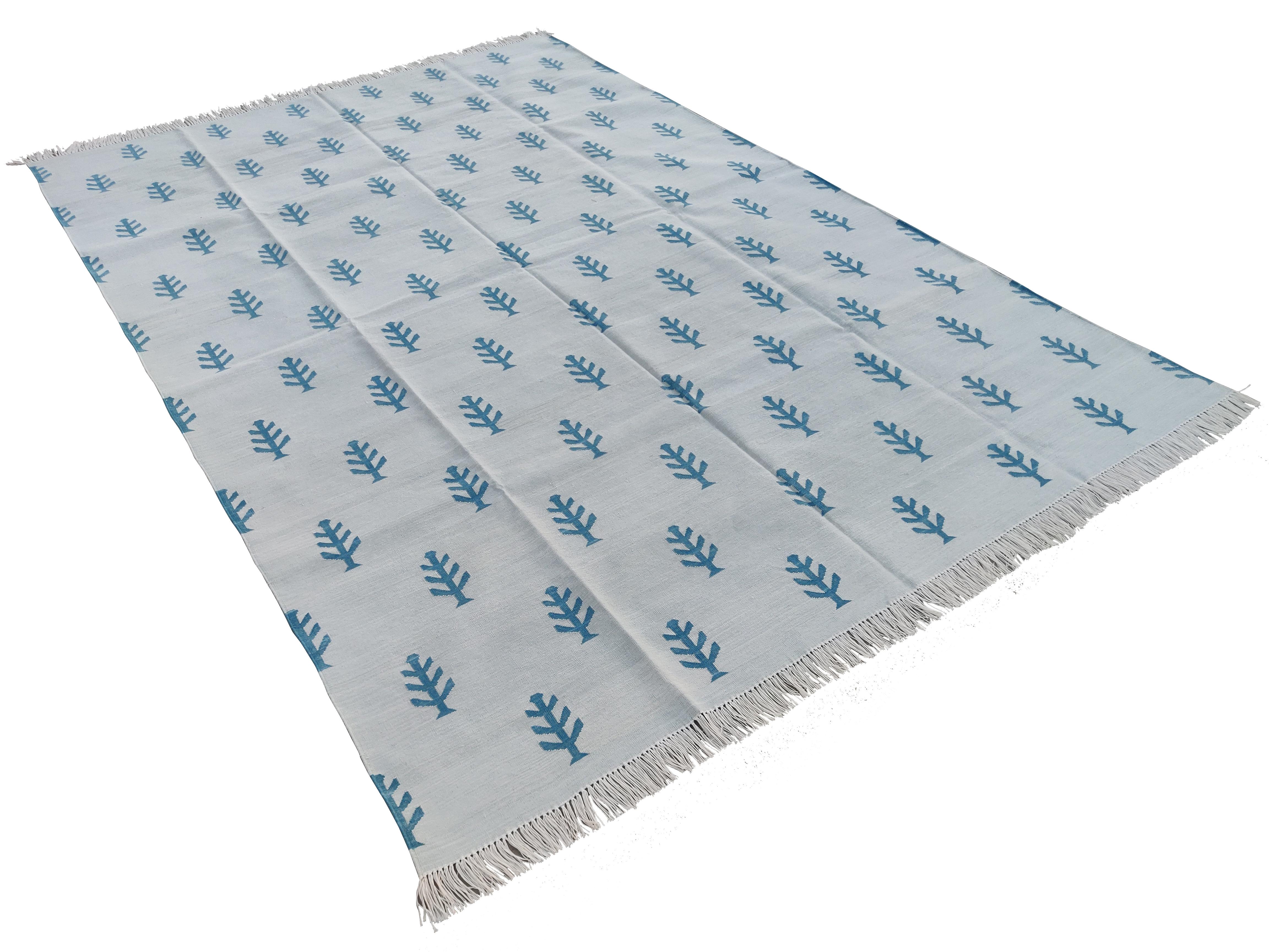 Cotton Vegetable Dyed Reversible Grey And Teal Blue Tree Patterned Indian Rug - 5'x7'
These special flat-weave dhurries are hand-woven with 15 ply 100% cotton yarn. Due to the special manufacturing techniques used to create our rugs, the size and