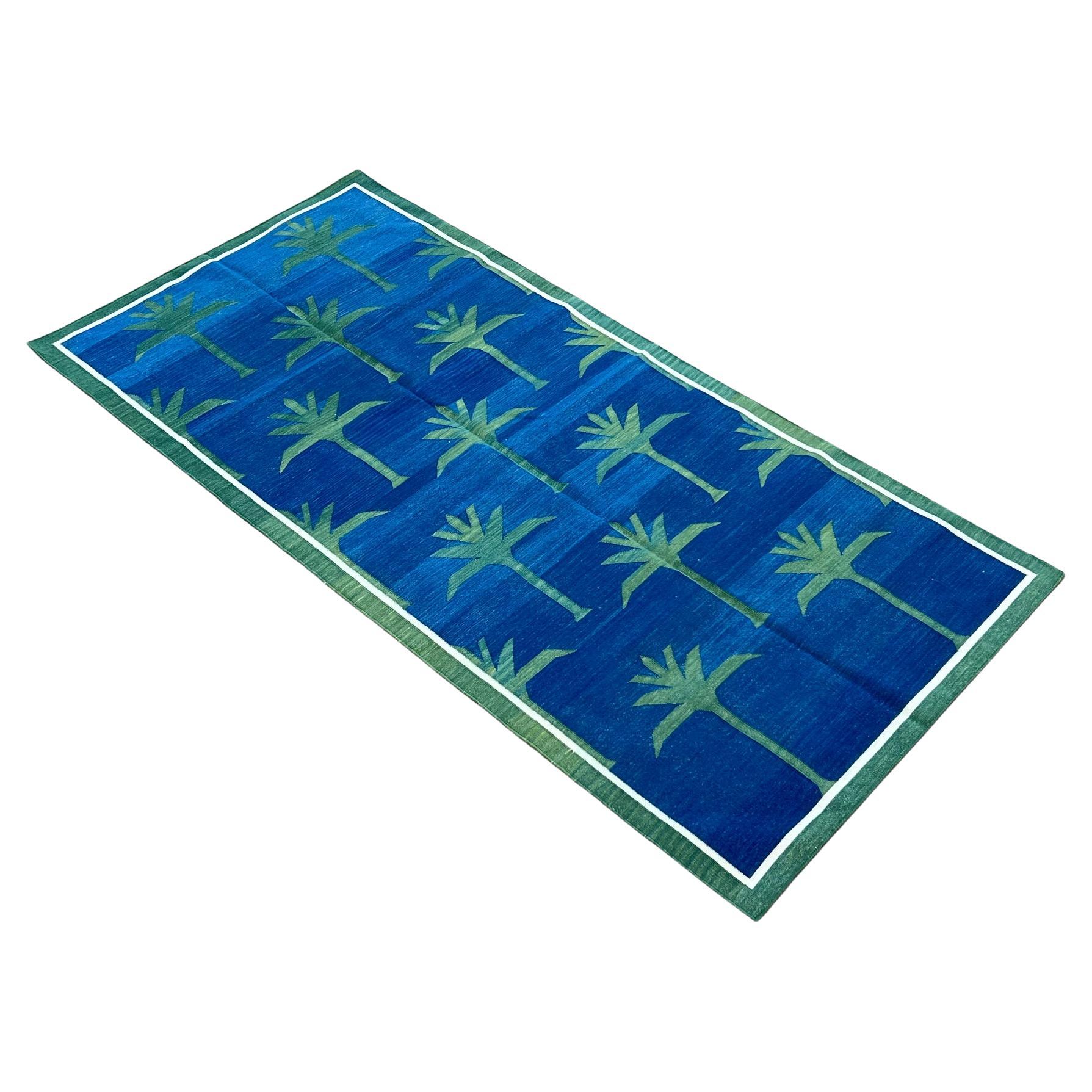 Handmade Cotton Area Flat Weave Rug, Indigo Blue, Green Palm Tree Indian Dhurrie For Sale