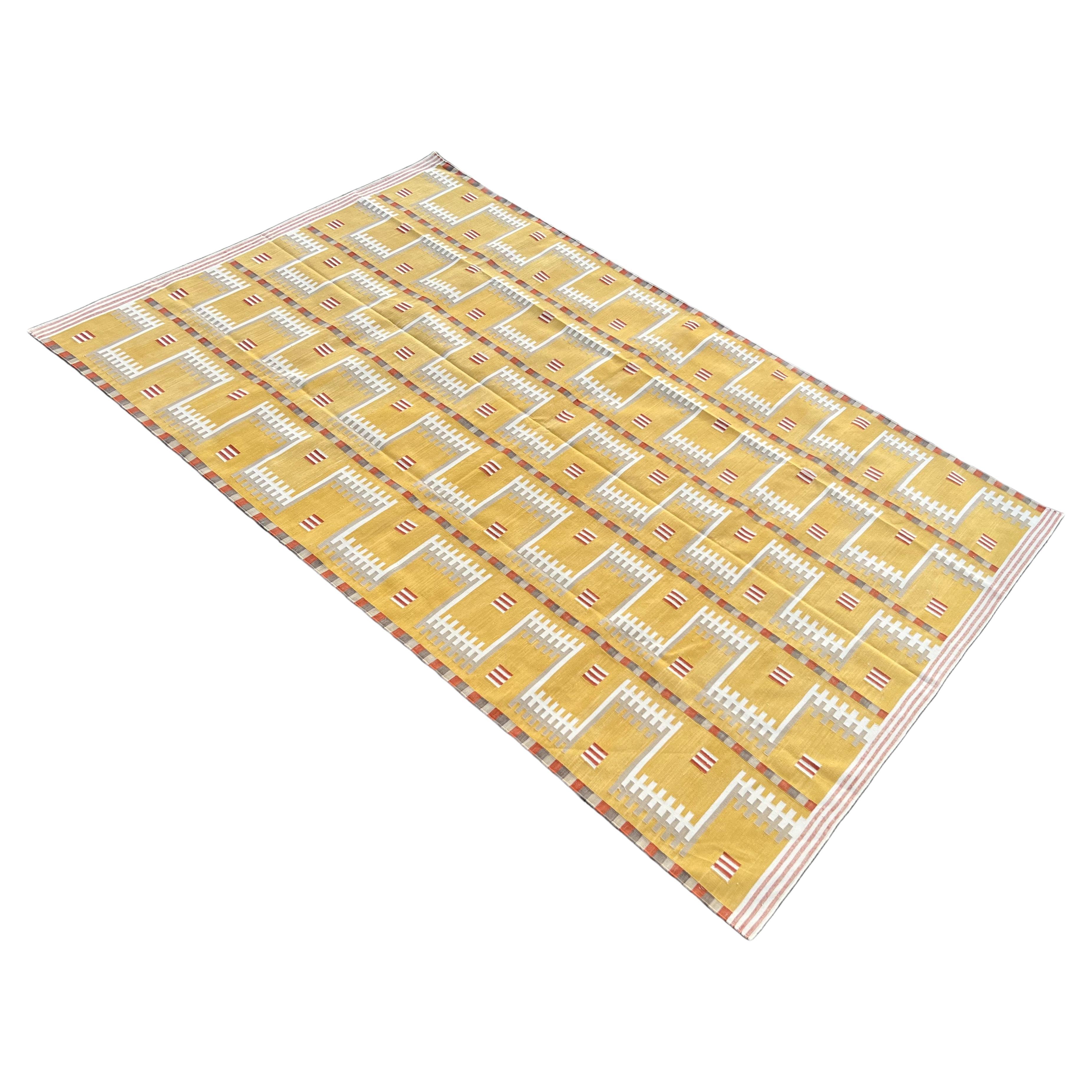 Mid-Century Modern Handmade Cotton Area Flat Weave Rug, Mustard And Beige Geometric Indian Dhurrie For Sale