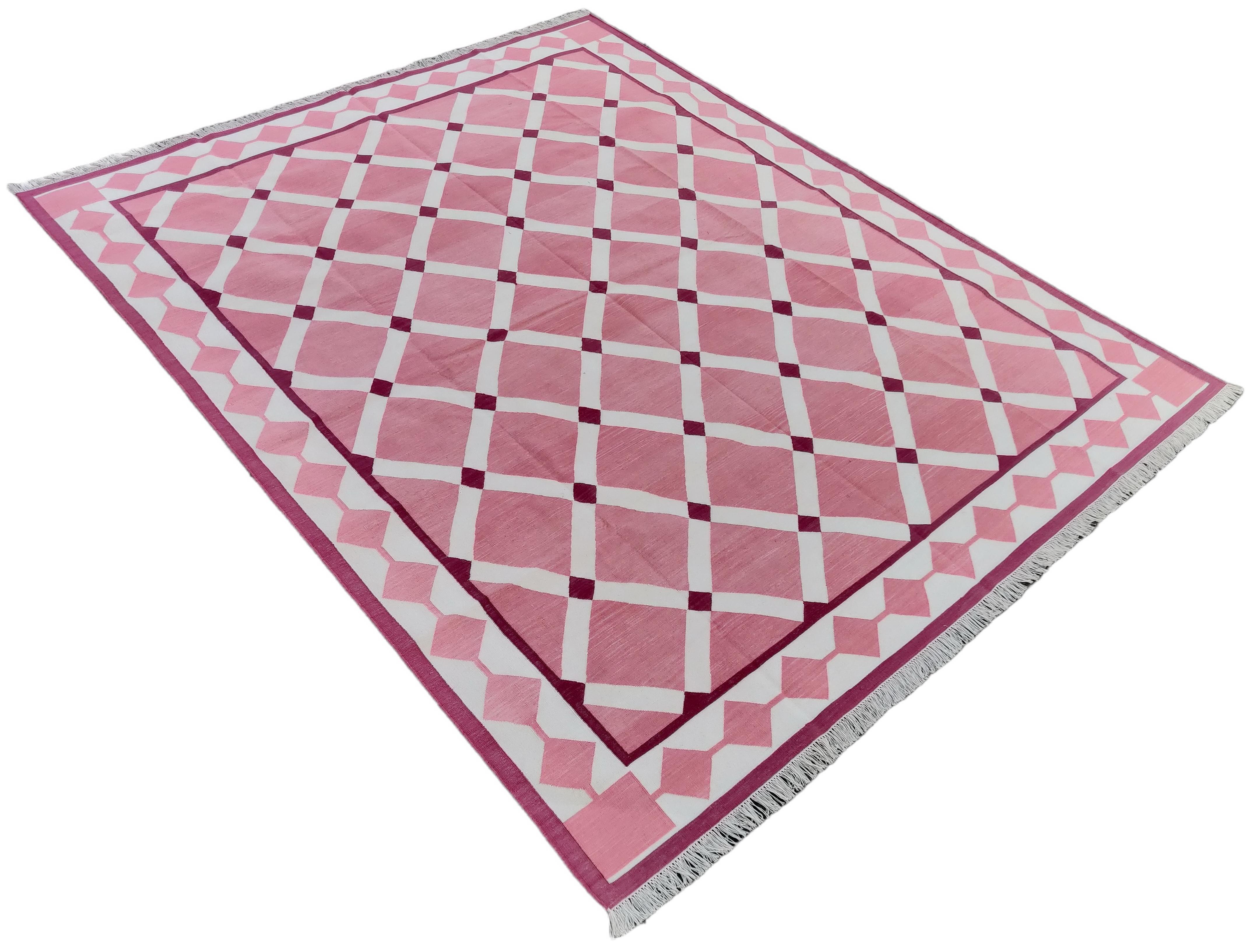 Cotton Vegetable Dyed Reversible Pink And White Indian Star Geometric Rug - 8'x10'
These special flat-weave dhurries are hand-woven with 15 ply 100% cotton yarn. Due to the special manufacturing techniques used to create our rugs, the size and color