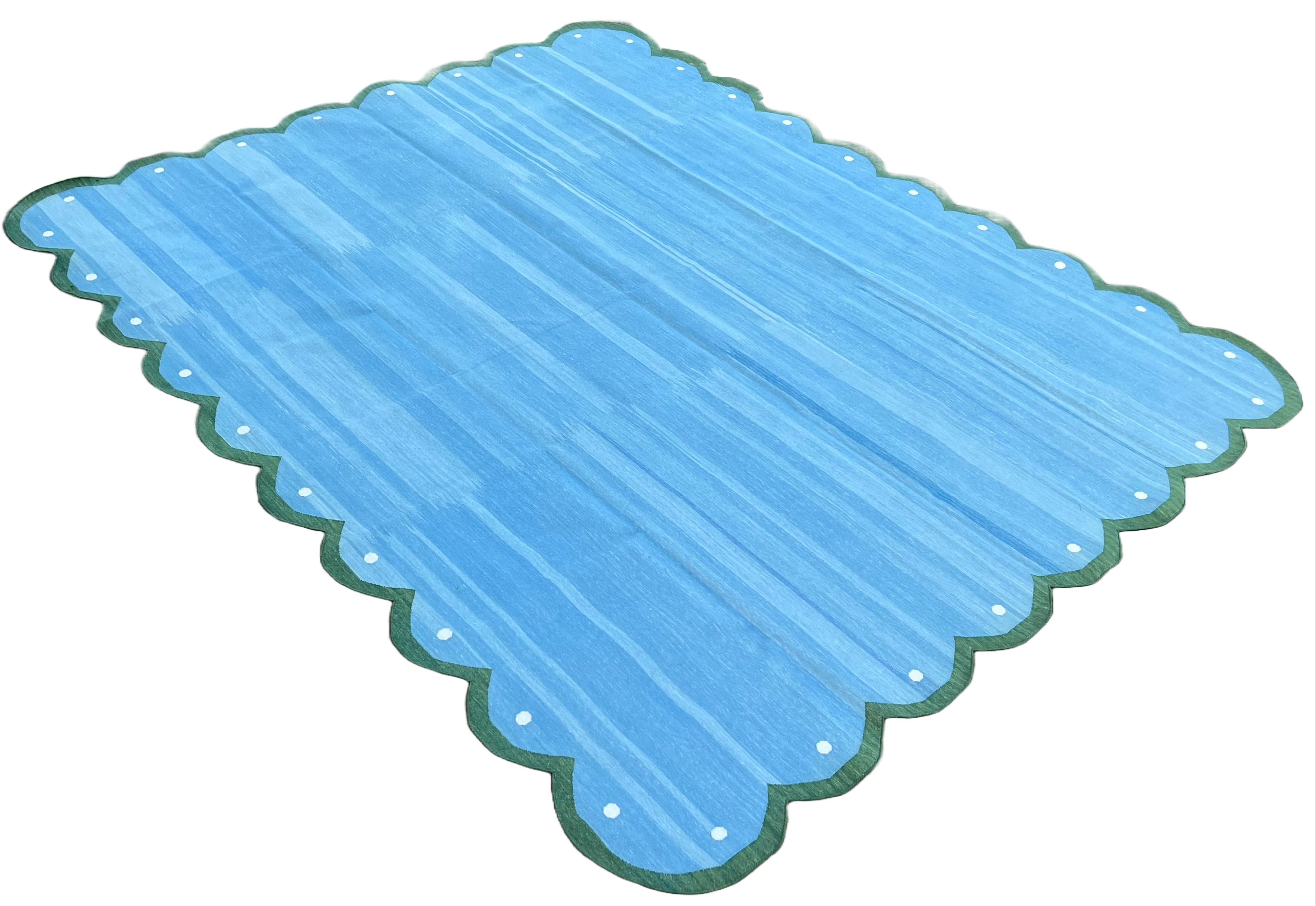 Cotton Vegetable Dyed Forest Sky Blue & Green Four Sided Scalloped Rug-8'x10' (Scallops runs all 4 Sides)
These special flat-weave dhurries are hand-woven with 15 ply 100% cotton yarn. Due to the special manufacturing techniques used to create our