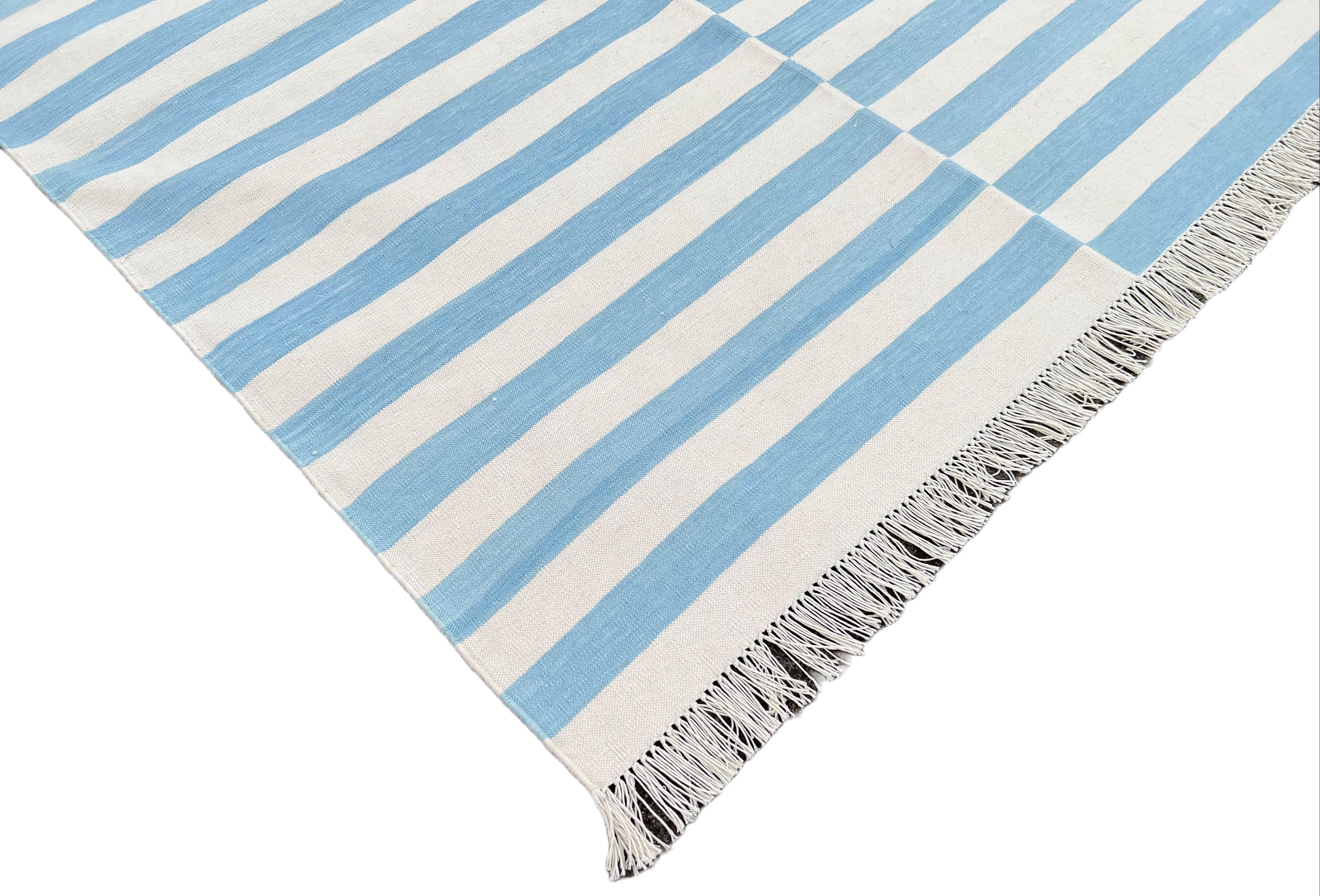 Cotton Vegetable Dyed Reversible Sky Blue And White Striped Indian Dhurrie Rug - 8'x10'
These special flat-weave dhurries are hand-woven with 15 ply 100% cotton yarn. Due to the special manufacturing techniques used to create our rugs, the size and