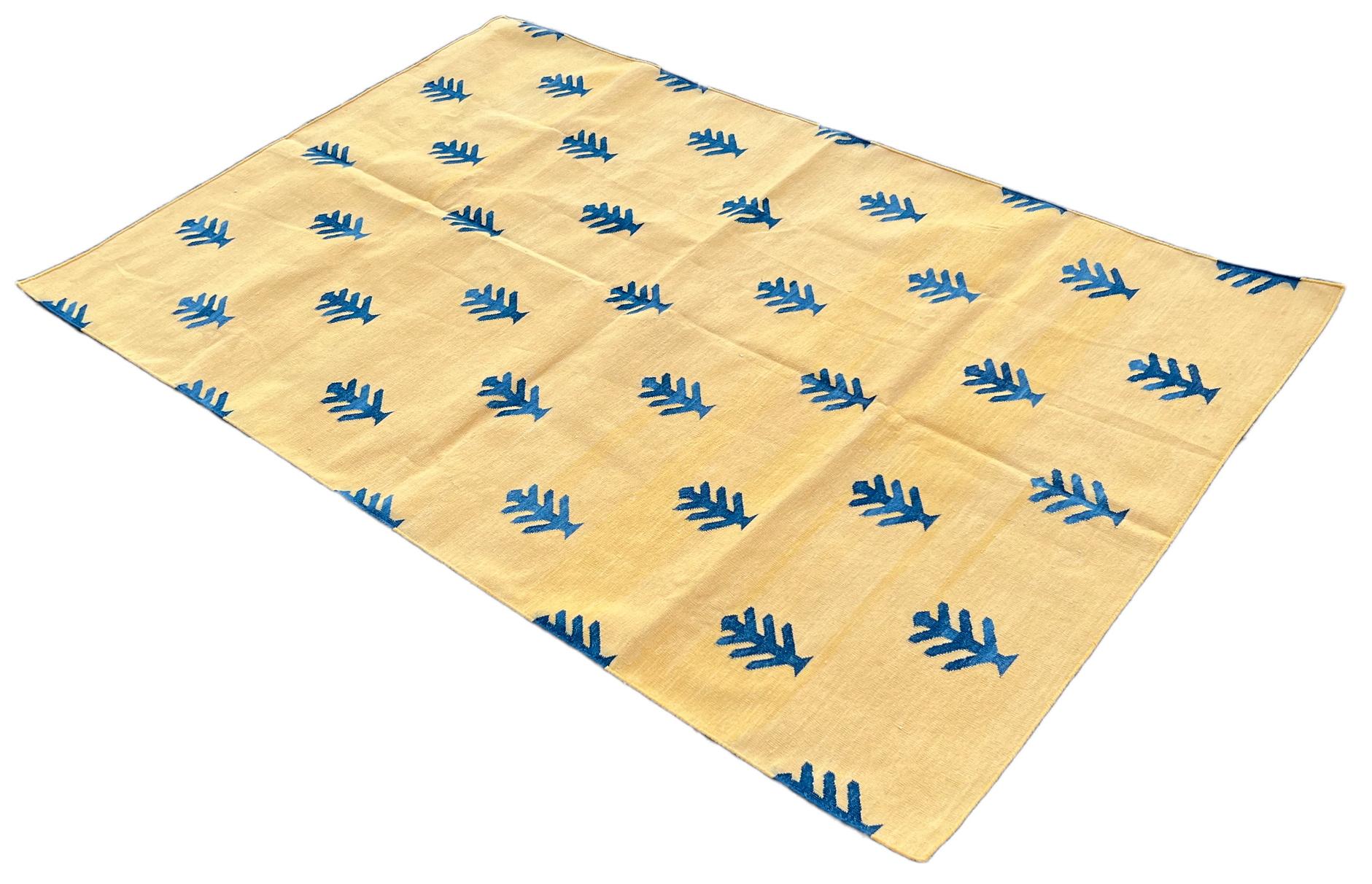 Cotton Vegetable Dyed Reversible Yellow And Blue Tree Patterned Indian Rug - 4'x6'
These special flat-weave dhurries are hand-woven with 15 ply 100% cotton yarn. Due to the special manufacturing techniques used to create our rugs, the size and color