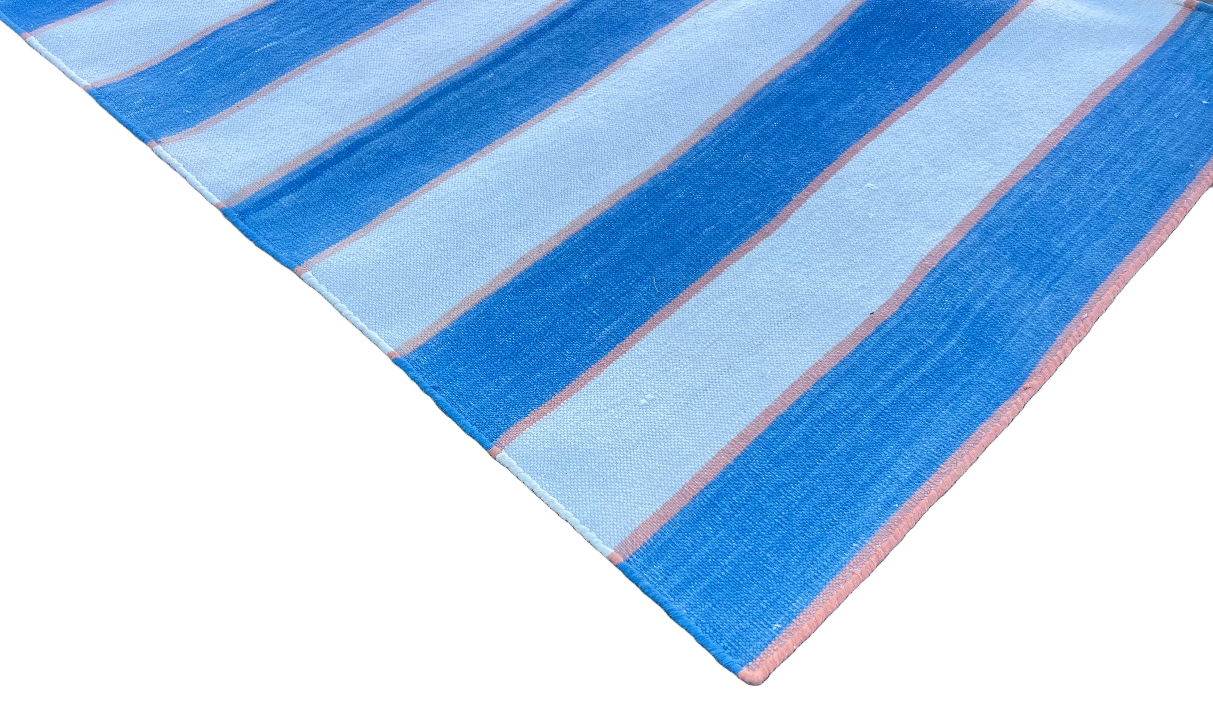 Runner indiano Dhurrie a righe in cotone Nature tinto al vegetale, blu cielo, arancione e crema 1'x10' (30x300cm)

Queste speciali dhurry a trama piatta sono tessute a mano con un filo di cotone 100% a 15 strati. A causa delle speciali tecniche di
