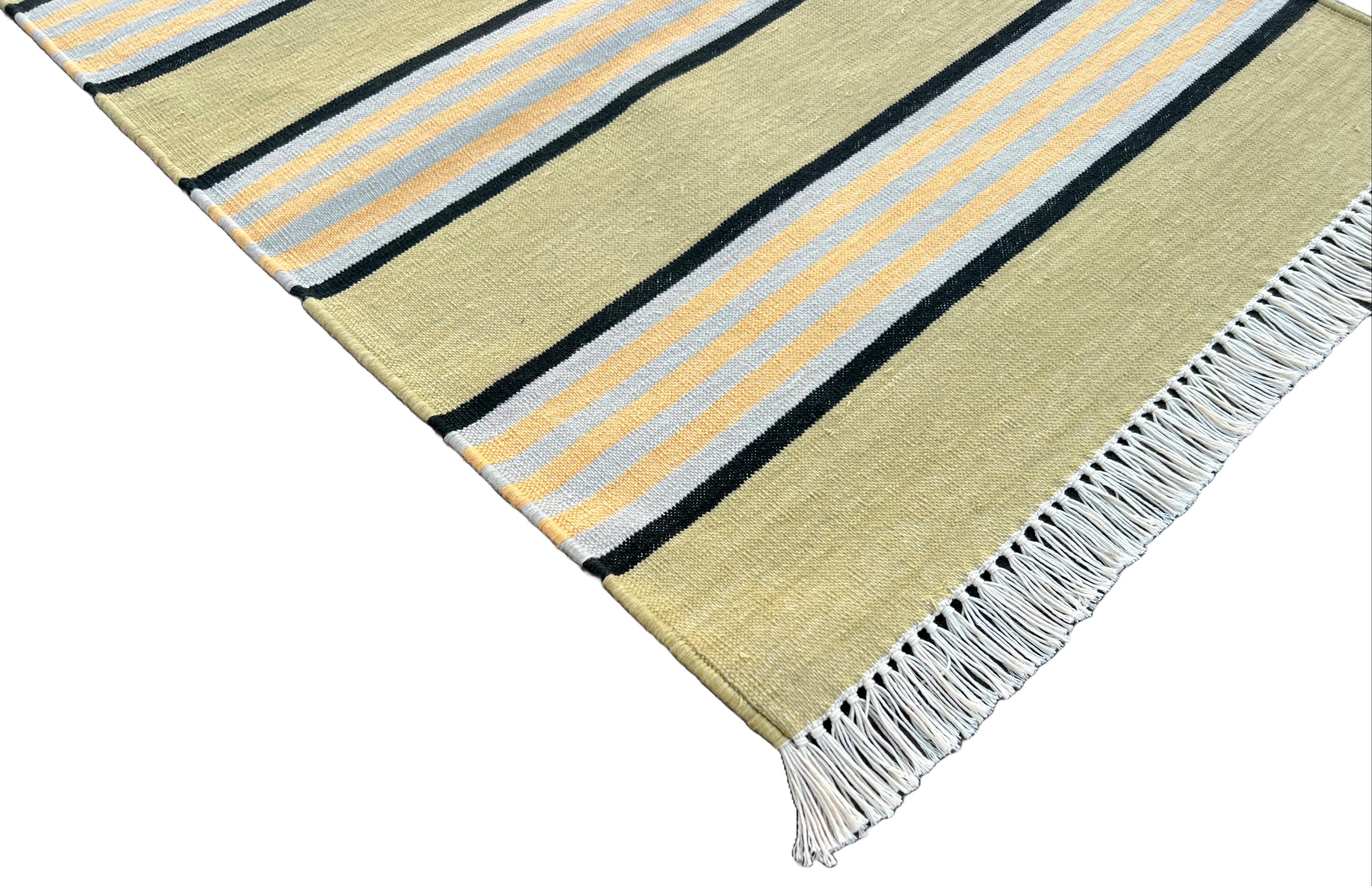 Cotton Natural Vegetable Dyed, Green, Yellow And Black Striped Indian Dhurrie Runner-2x10 feet (60x300cm)
These special flat-weave dhurries are hand-woven with 15 ply 100% cotton yarn. Due to the special manufacturing techniques used to create our