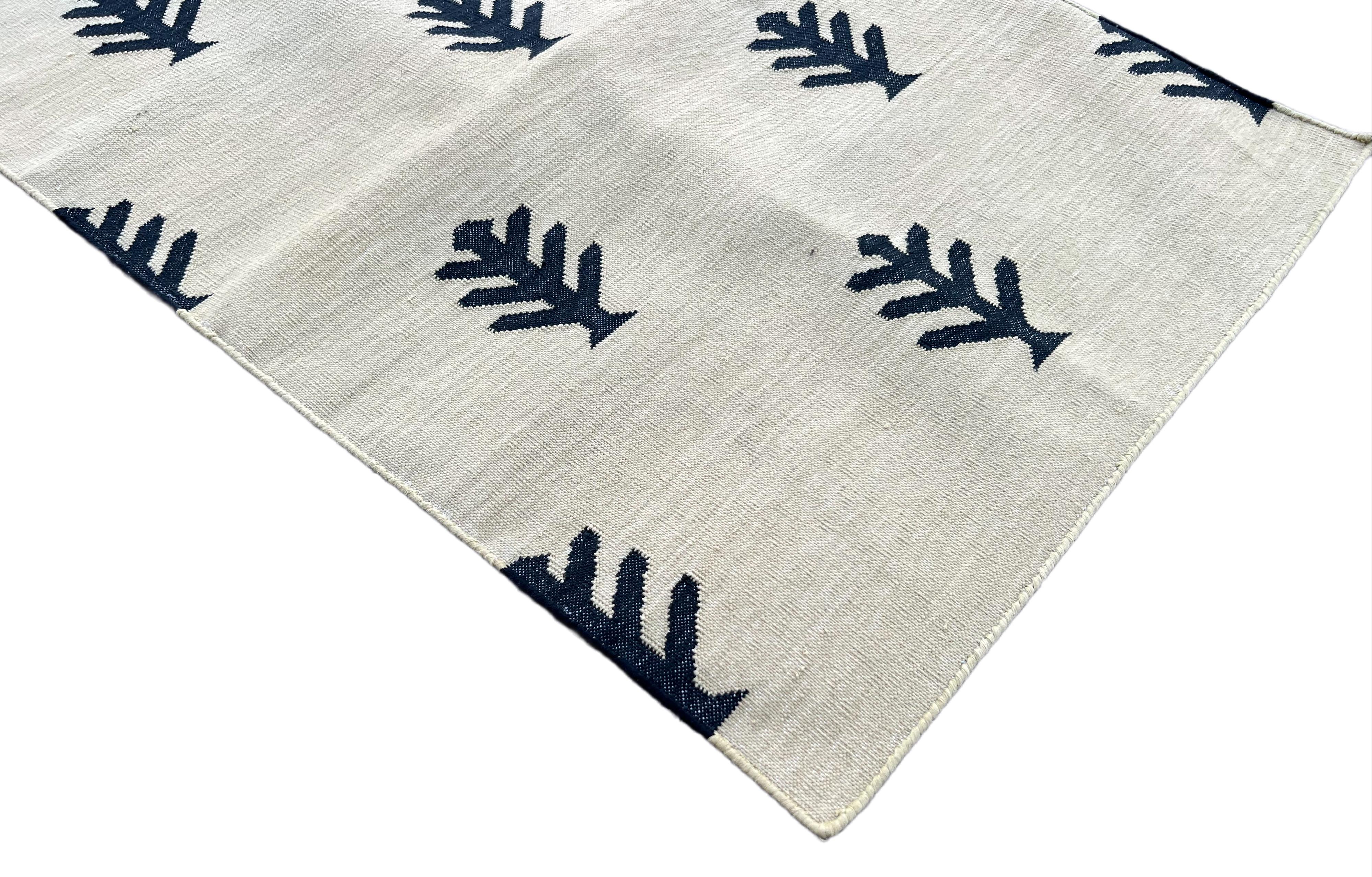 Cotton Natural Vegetable Dyed, Olive Green And Black Tree Patterned Indian Dhurrie Runner-2x6 feet (60x180cm)
These special flat-weave dhurries are hand-woven with 15 ply 100% cotton yarn. Due to the special manufacturing techniques used to create