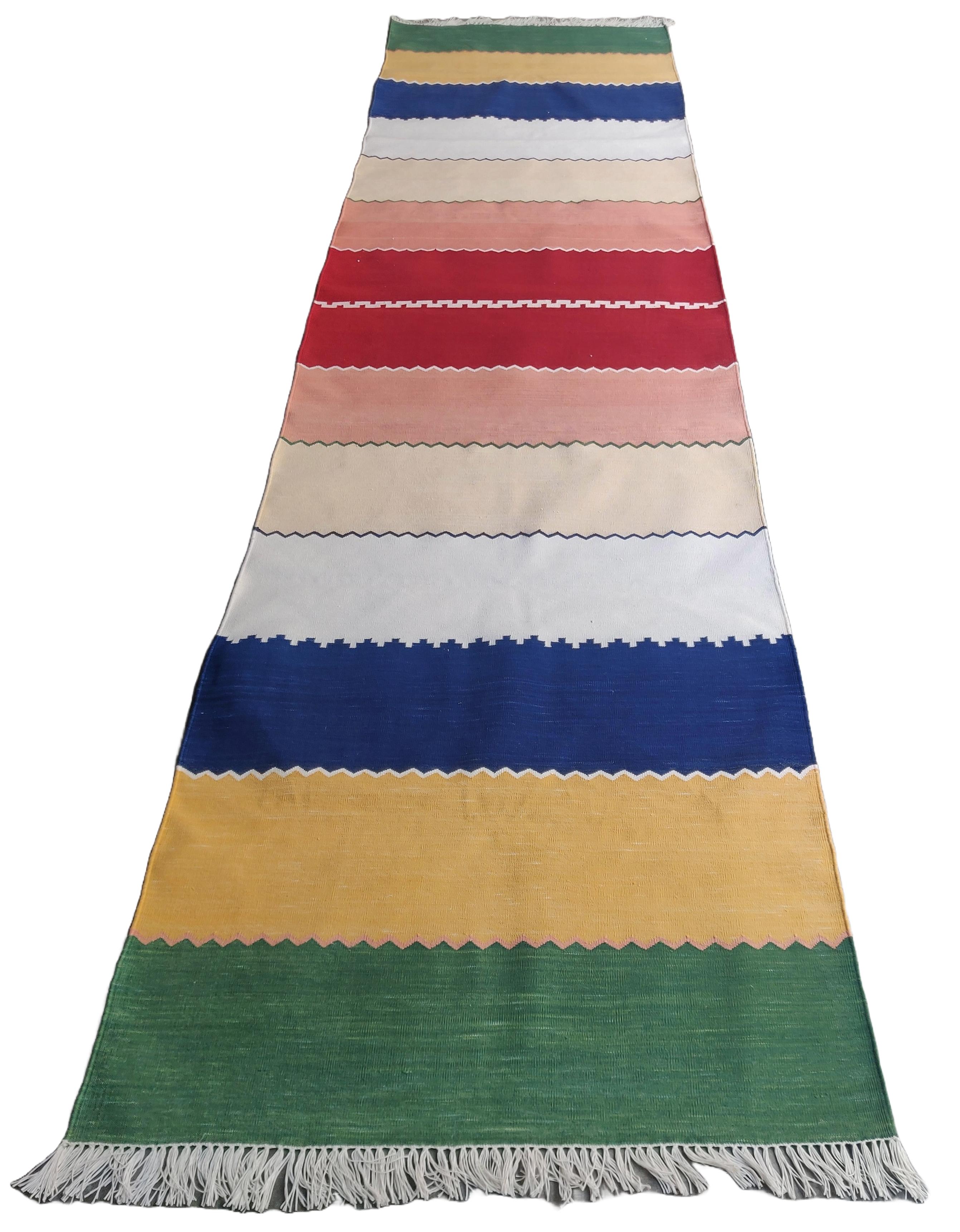 Cotton Natural Vegetable Dyed, Green, Mustard, Blue, Cream, Pink & Red Striped Indian Dhurrie Runner-3'x12'
These special flat-weave dhurries are hand-woven with 15 ply 100% cotton yarn. Due to the special manufacturing techniques used to create our