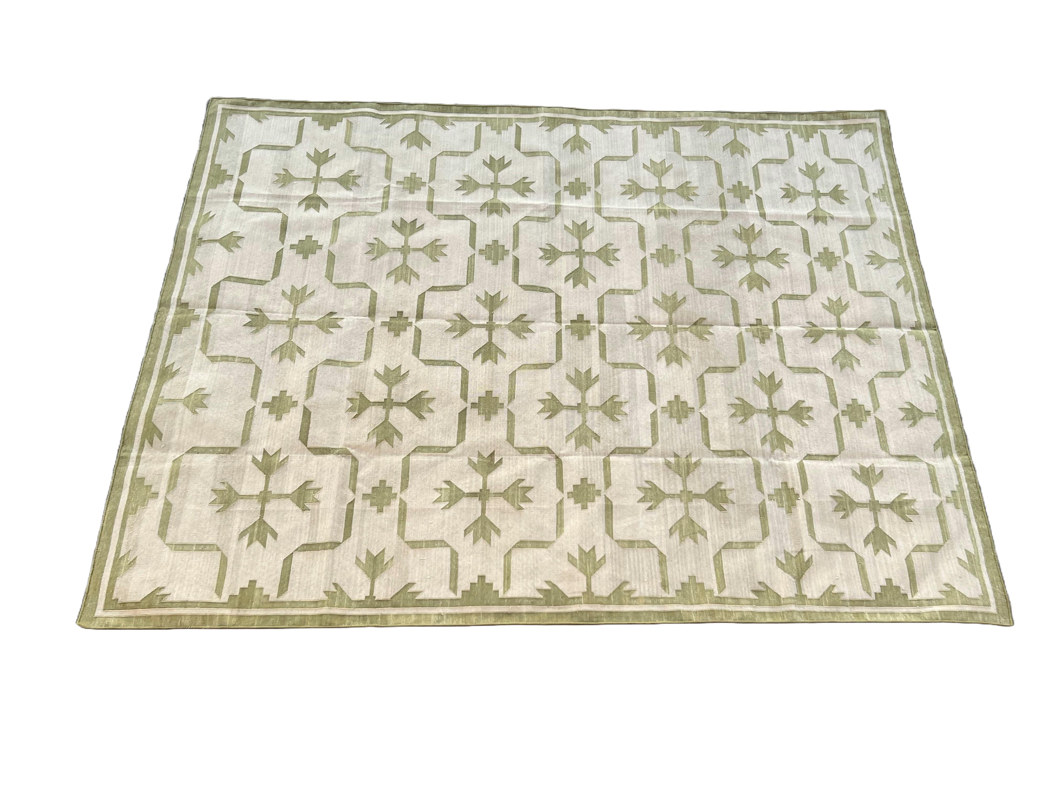 Cotton Vegetable Dyed Area Rug, Beige And Olive Green Leaf Patterned Indian Dhurrie Rug-6'x9' (180x270cm)

These special flat-weave dhurries are hand-woven with 15 ply 100% cotton yarn. Due to the special manufacturing techniques used to create our