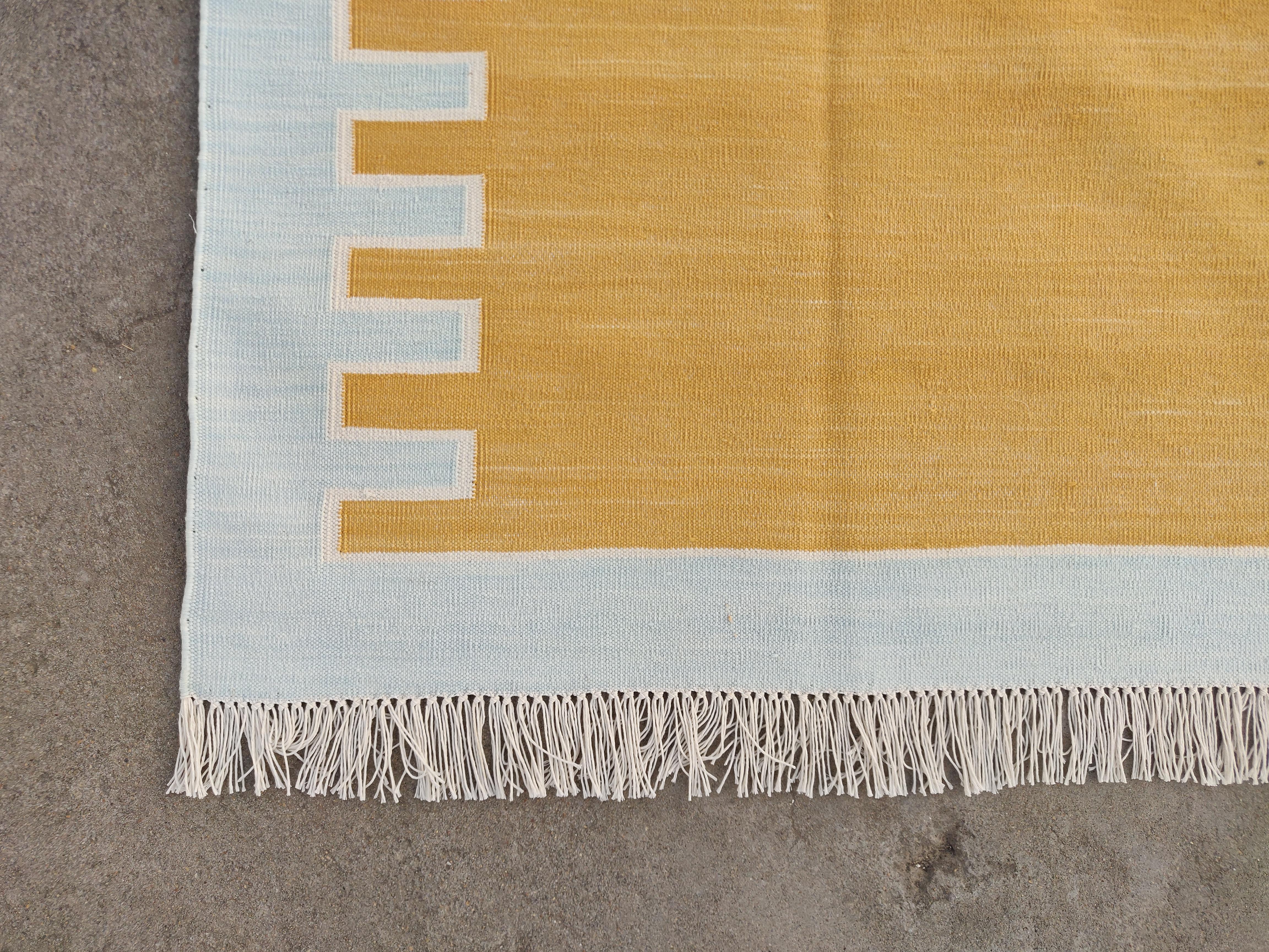 Contemporary Handmade Cotton Flat Weave Area Rug, 6x9 Yellow And Blue Striped Indian Dhurrie For Sale