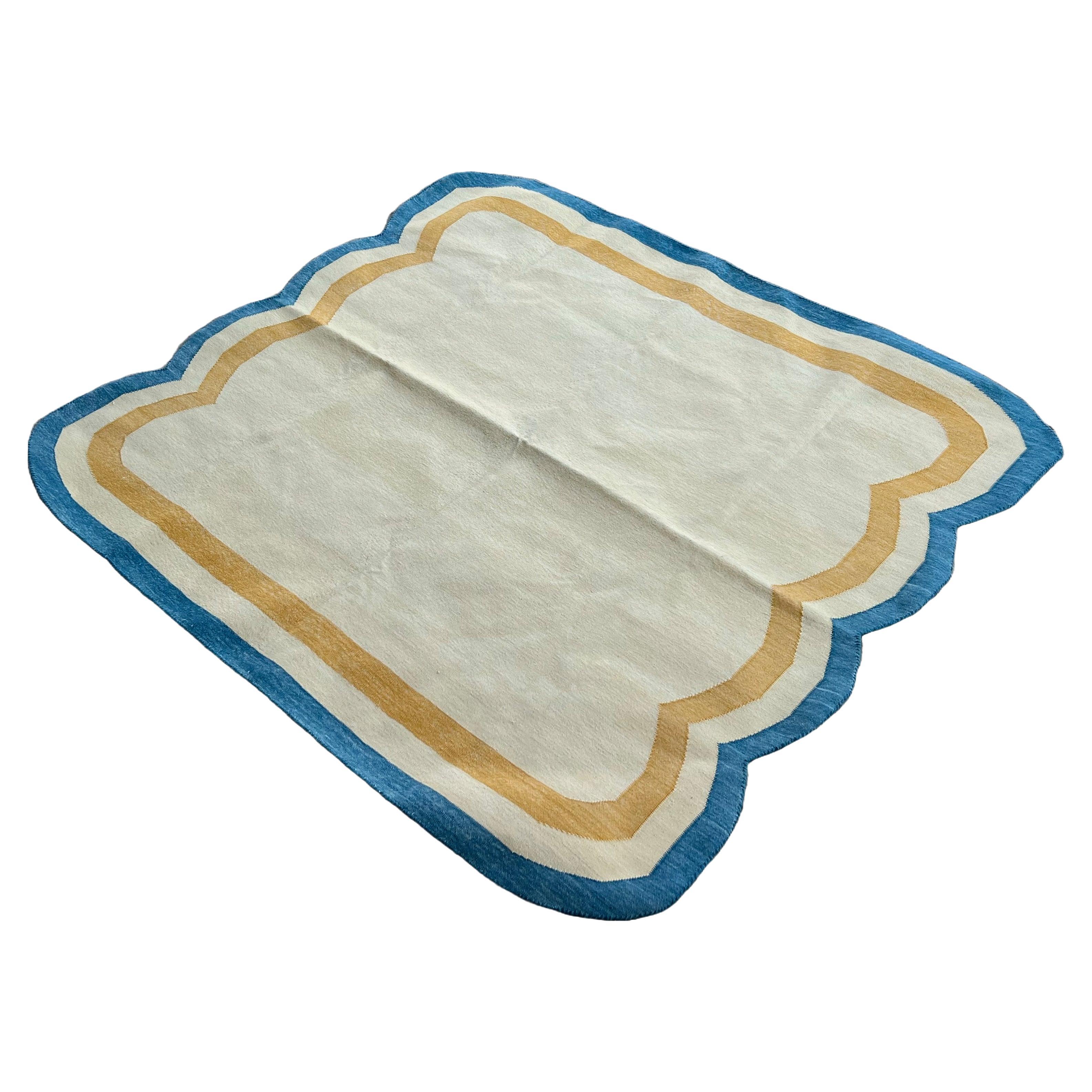 Tappeto fatto a mano in cotone a trama piatta, 4x6 crema e blu acqua con smerlatura indiana Dhurrie