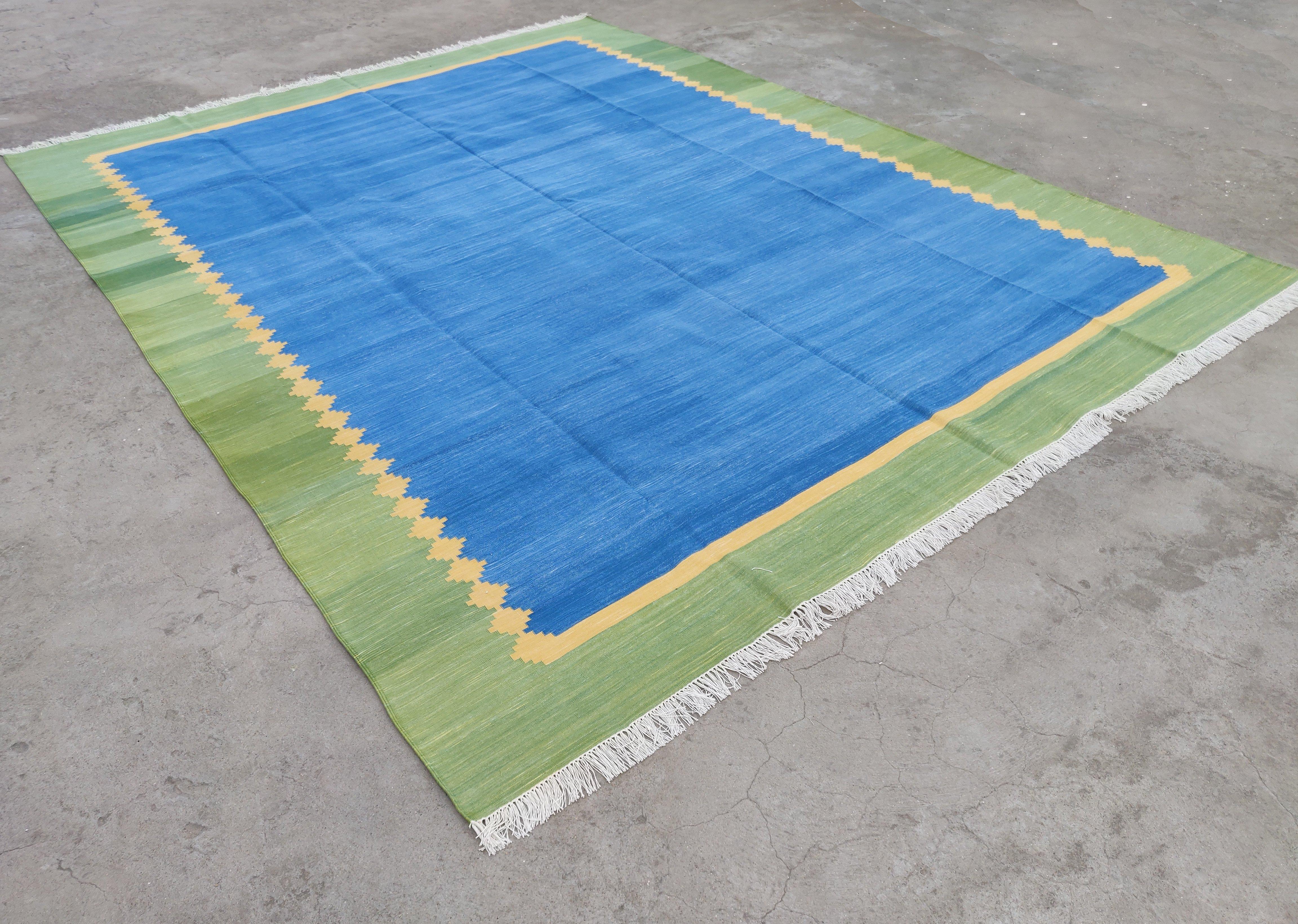 Cotton Vegetable Dyed Area Rug, Sky Blue, Yellow And Green Bordered Star Indian Rug-8'x10'
These special flat-weave dhurries are hand-woven with 15 ply 100% cotton yarn. Due to the special manufacturing techniques used to create our rugs, the size