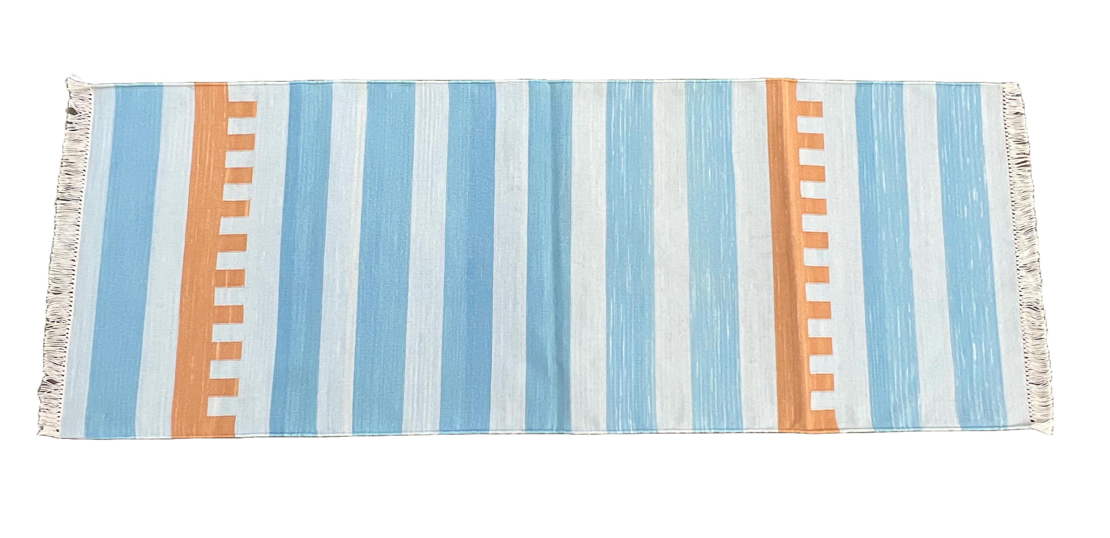 Cotton Natural Vegetable Dyed, Sky Blue, Cream And Blue Indian Dhurrie Runner-2'x5.5' (60x168cm)
These special flat-weave dhurries are hand-woven with 15 ply 100% cotton yarn. Due to the special manufacturing techniques used to create our rugs, the