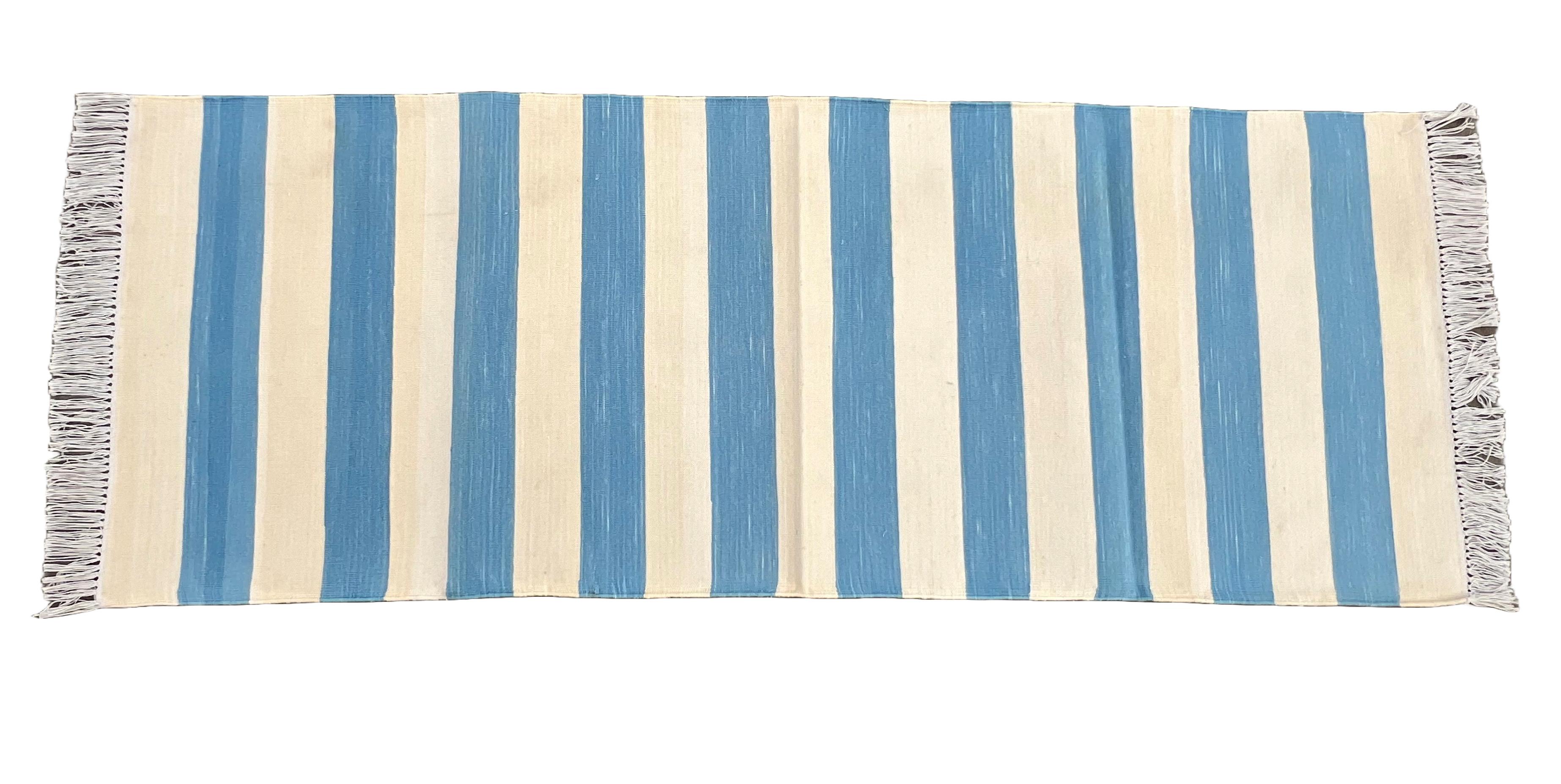 Cotton Natural Vegetable Dyed, Sky Blue And Cream Indian Dhurrie Runner-2'x5.5' (60x168cm)
These special flat-weave dhurries are hand-woven with 15 ply 100% cotton yarn. Due to the special manufacturing techniques used to create our rugs, the size