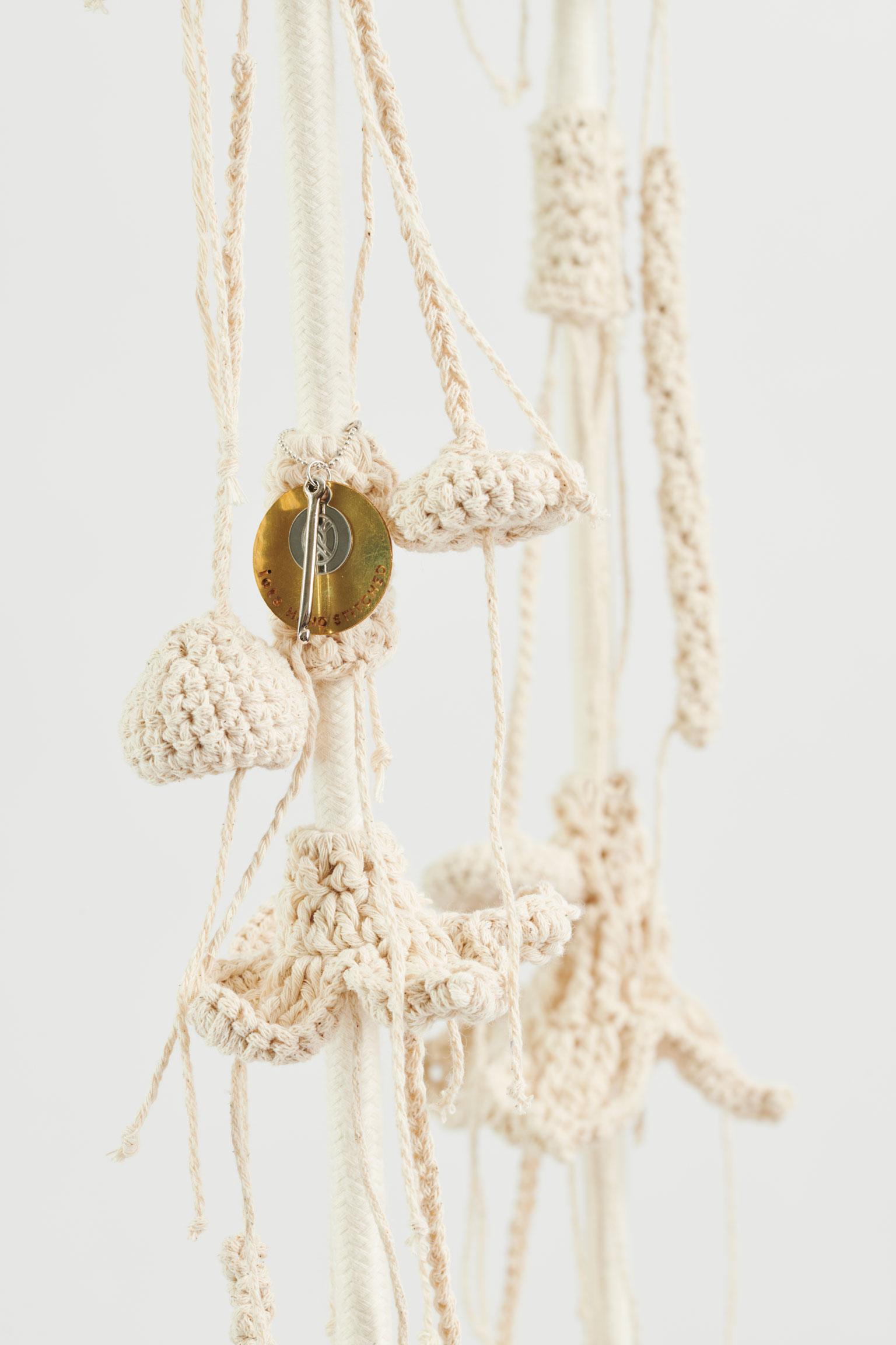 The iota desert swing, influenced by desert aesthetics, takes the user to a wild, natural, fantastic place. The swing showcases much of our special knitted hand work. The numerous intricate elements that form the swing are hand knit with bespoke