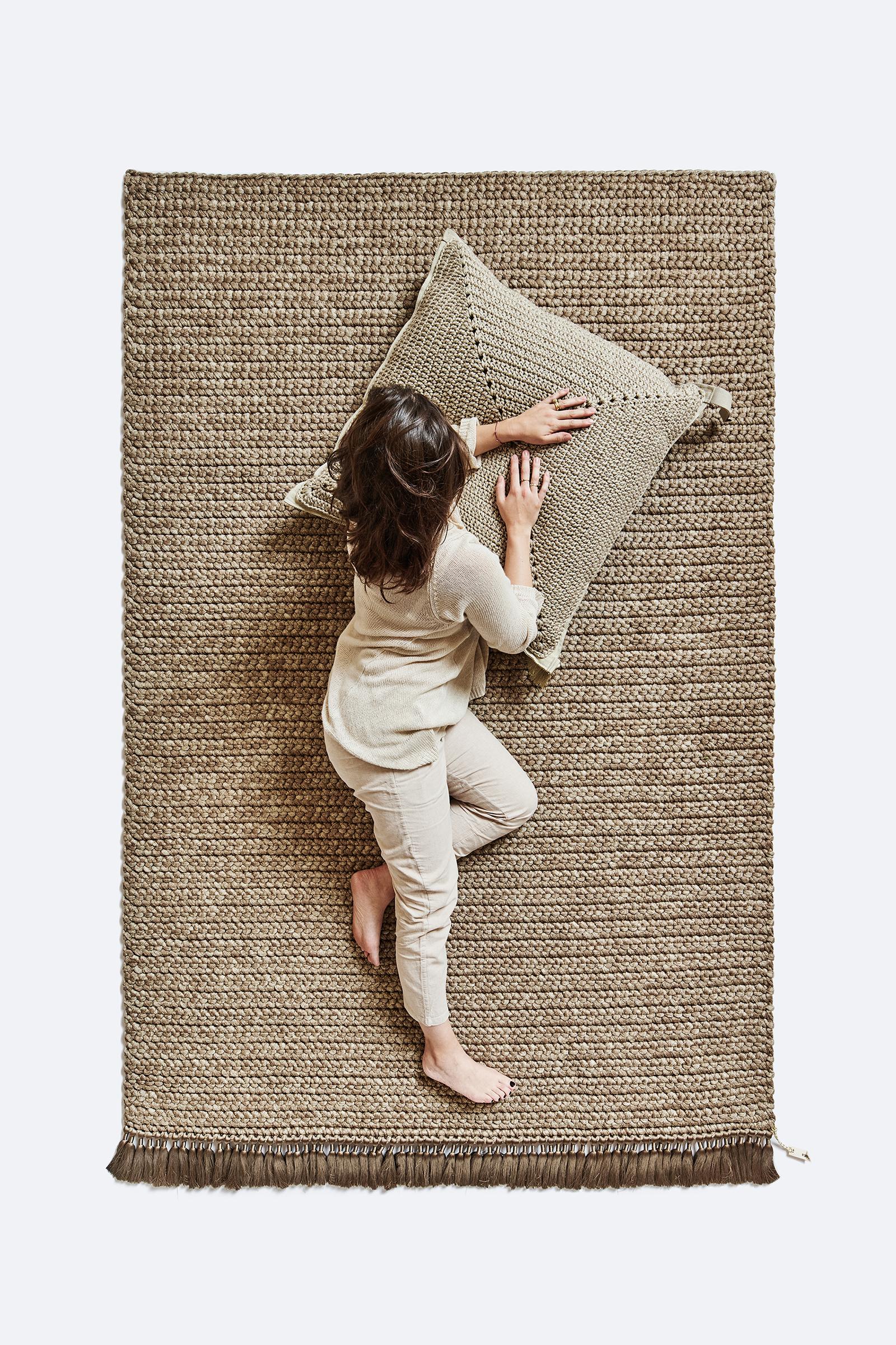IOTA rugs are thick, soft, hand knit and luxurious, 3 times thicker than the standard rug. The Two Tone medium rugs create a subtle gradient that will light up any space, suitable for an intimate corner in the living space as well as for bedrooms,