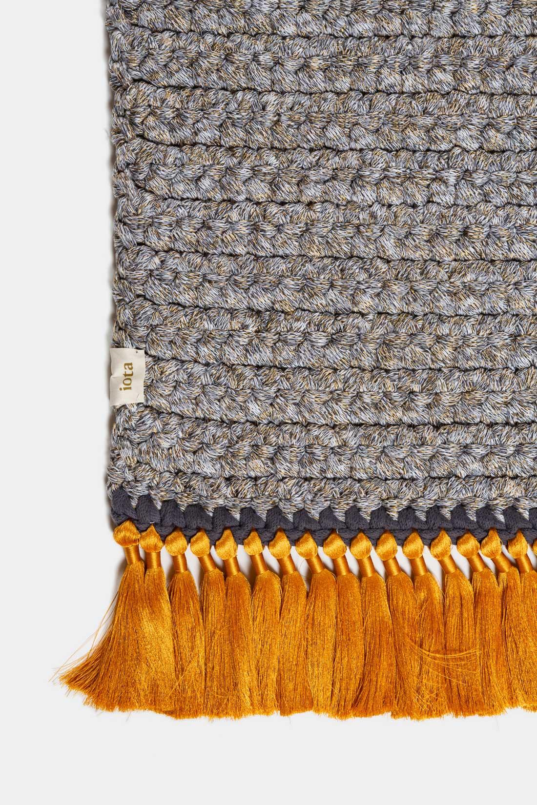 IOTA rugs are thick, soft, hand knit and luxurious, 3 times thicker than the standard rug. The Two Tone medium rugs create a subtle gradient that will light up any space, suitable for an intimate corner in the living space as well as for bedrooms,