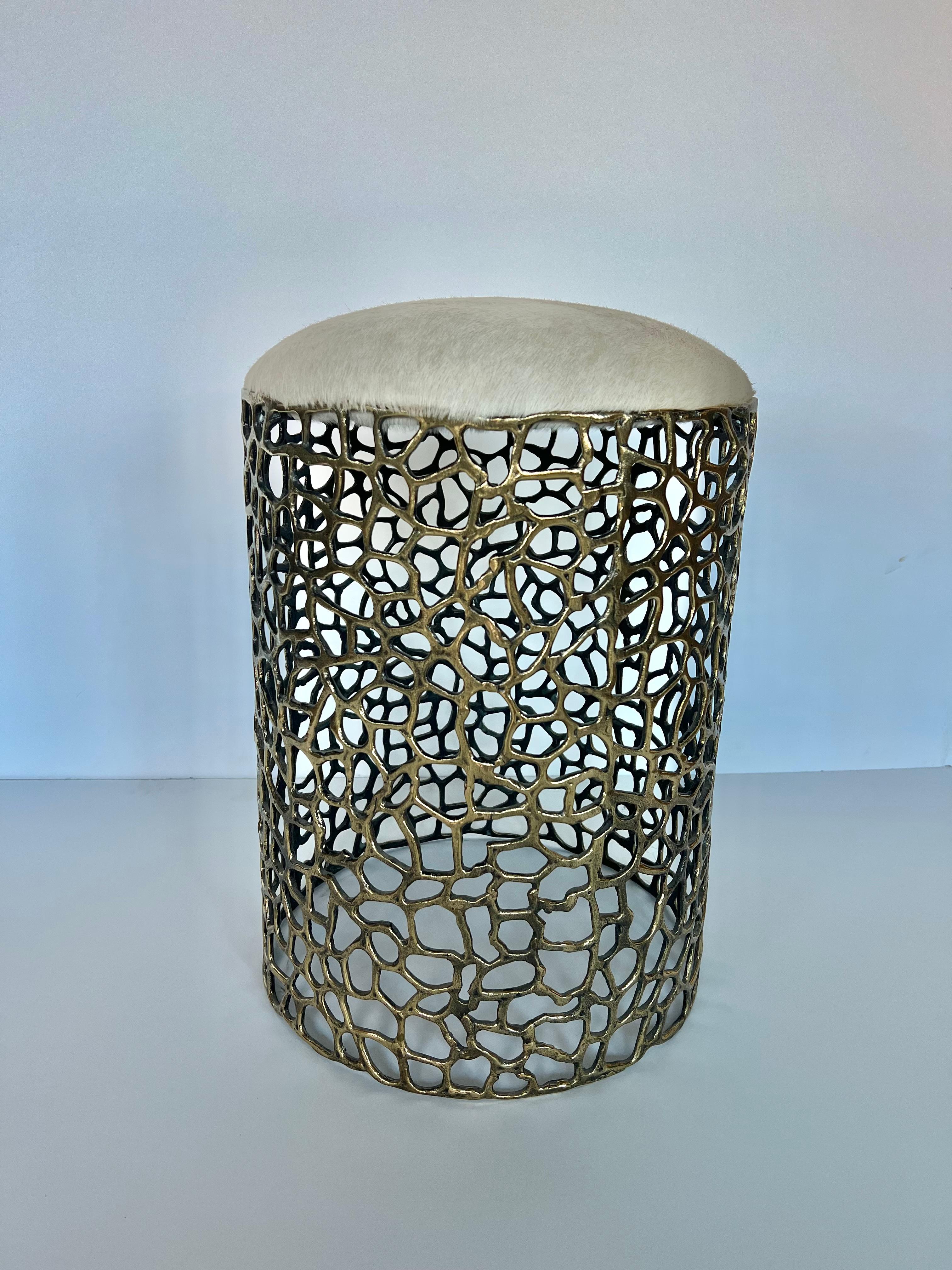 1990’s handmade brass stool with new hide upholstery. Please contact 1stdibs for international shipping quote. 