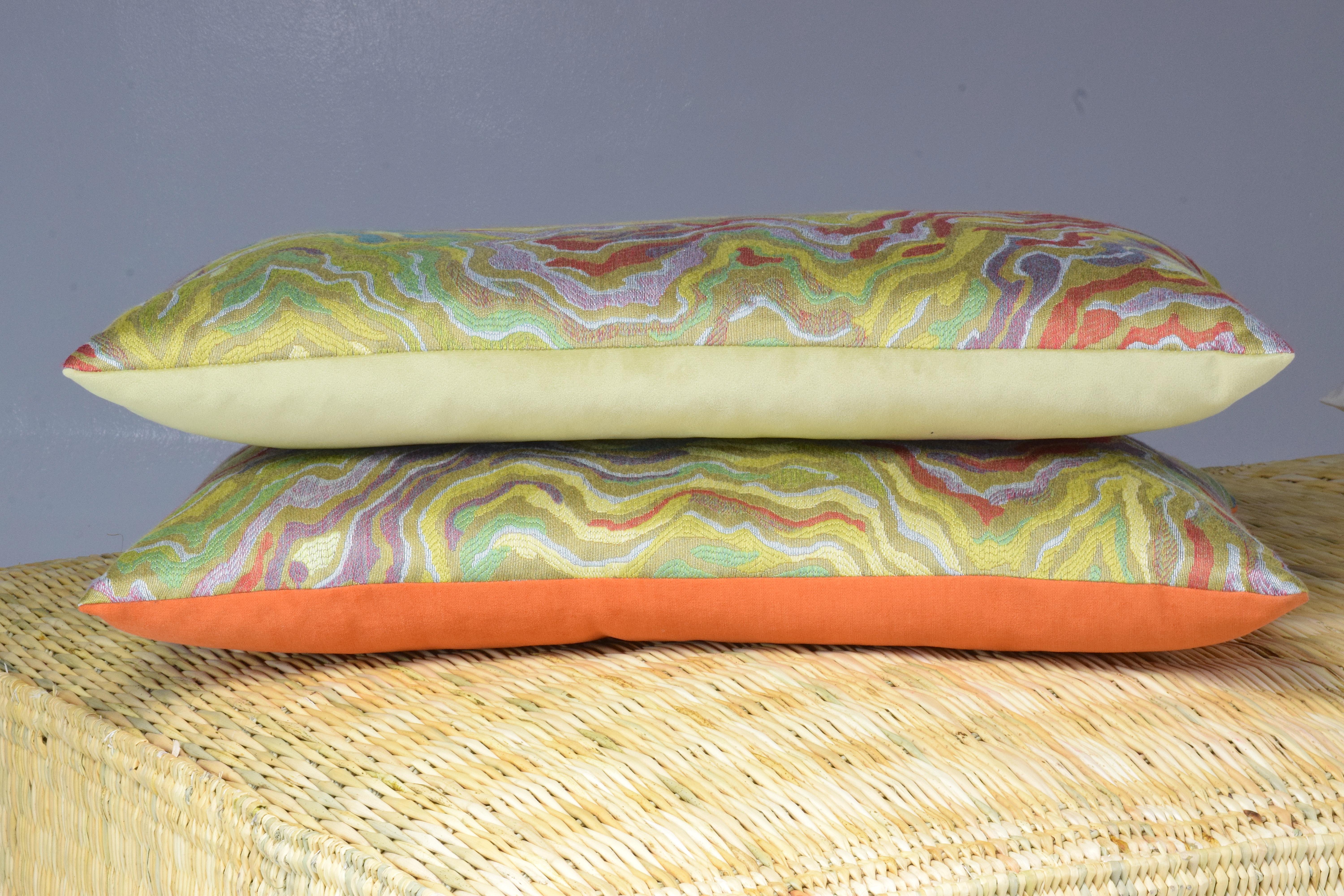 A rectangular cushion with embossed weaving, in linen and cotton on the front side, and orange or yellow velvet on the back side. Perfect to add a colorful touch to your home decor. Our pillows are handmade using limited edition fabrics from