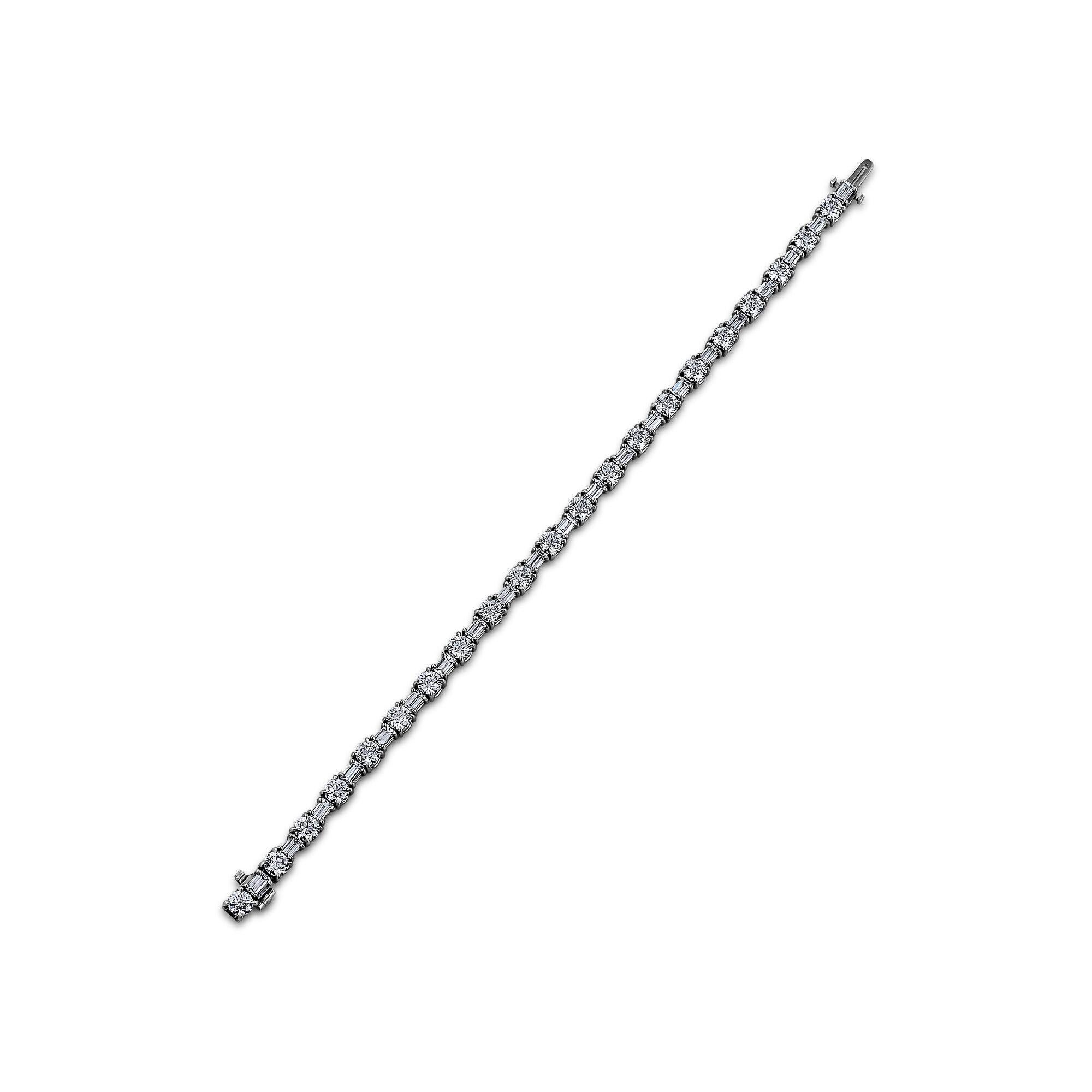 With a total of 7.88 carats of alternating round brilliant ideal cut diamonds, this elegant bracelet is the perfect line up.  Handmade by Steven Fox Jewelry and mounted in platinum, this classic line bracelet will give you the sparkle, sizzle, and