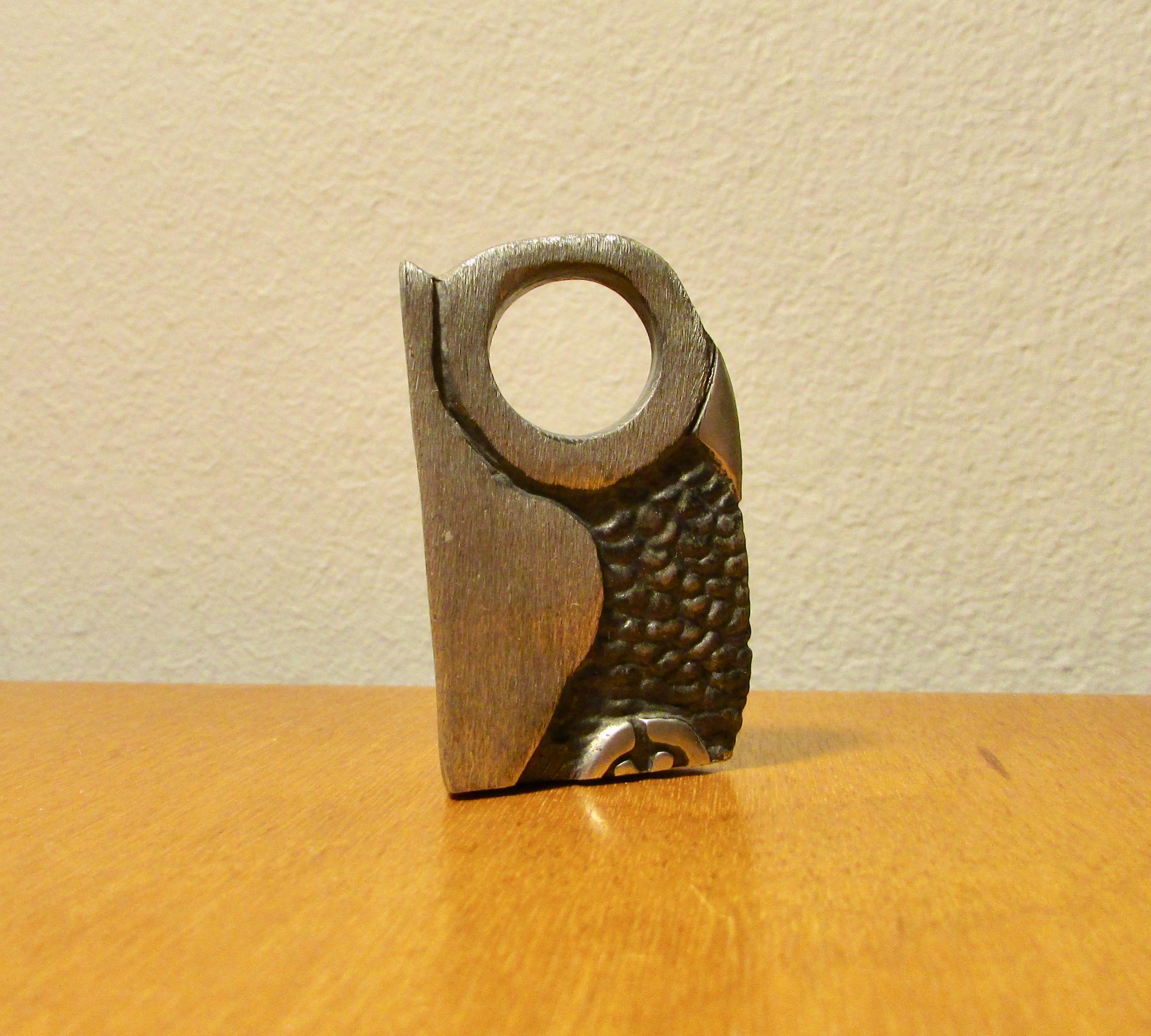Nicely detailed diminutive metal owl sculpture for desktop or collection. Weighty - possibly pewter. Signed Clarence.