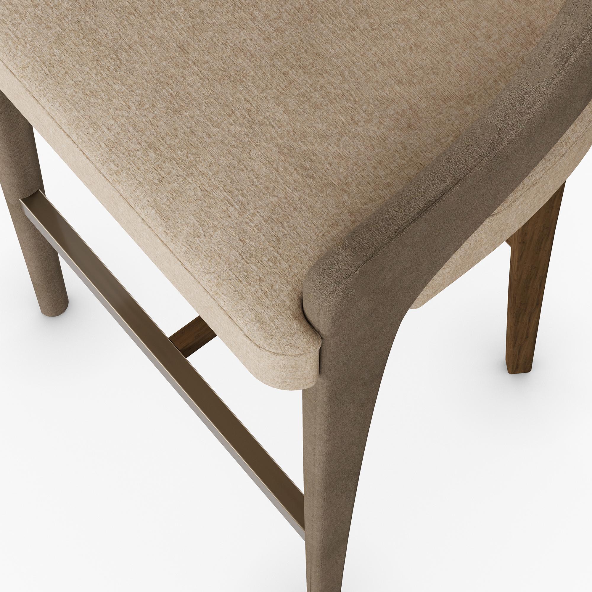 La sedia da bar Dini di Nolita Harbour è una combinazione perfetta di stile sofisticato e comfort ergonomico, progettata per elevare qualsiasi bar o cucina moderna. Questa sedia presenta una silhouette elegante che pone l'accento sia sulla forma che