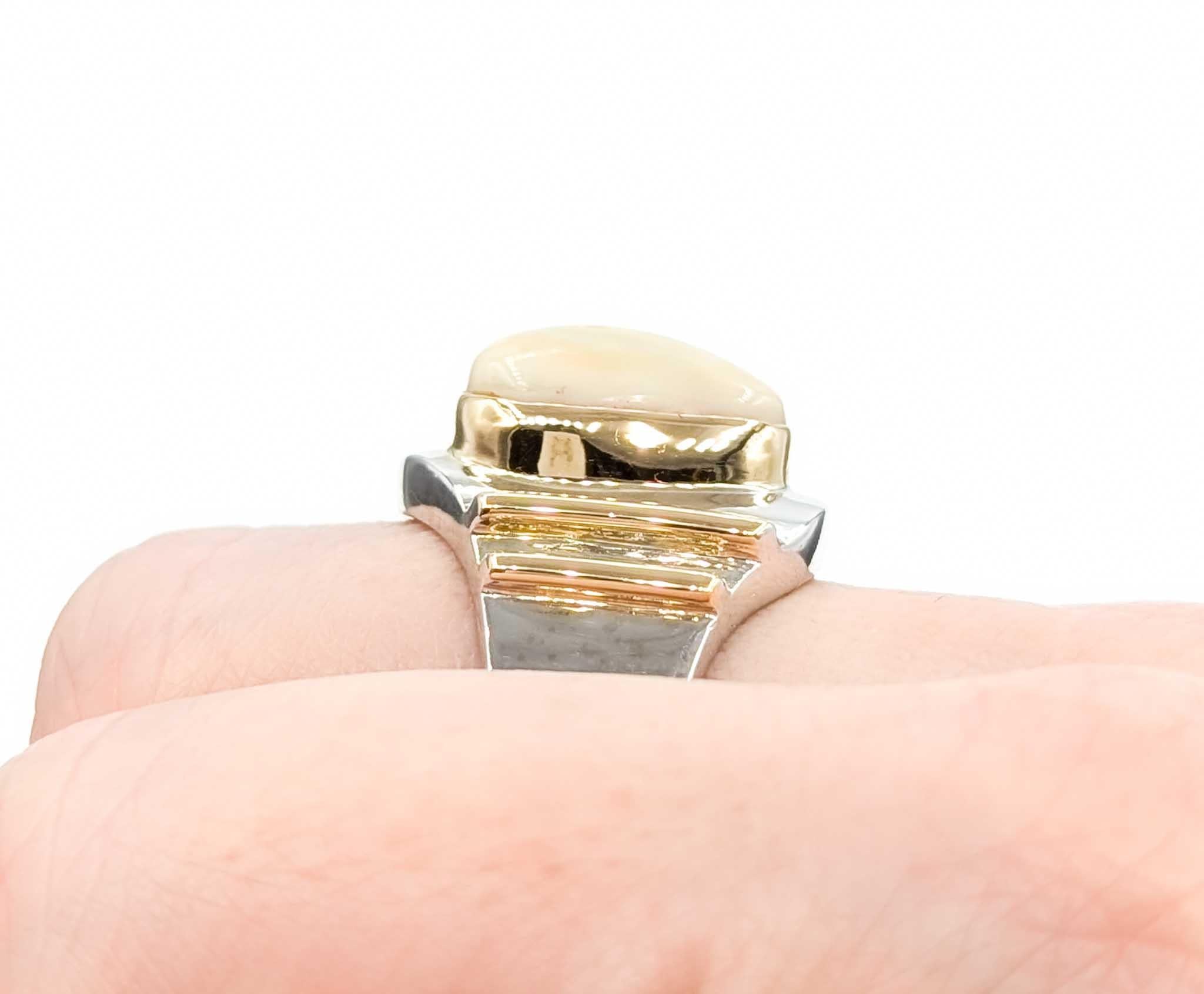 Vintage Handmade Elk Took Ring with Diamonds in Two Tone Gold

This beautiful Elk Took & Diamond Ring is beautifully crafted in 14k two tone gold. Thisring features a fantastic elks tooth, bezel set in yellow gold. The channel set diamonds are