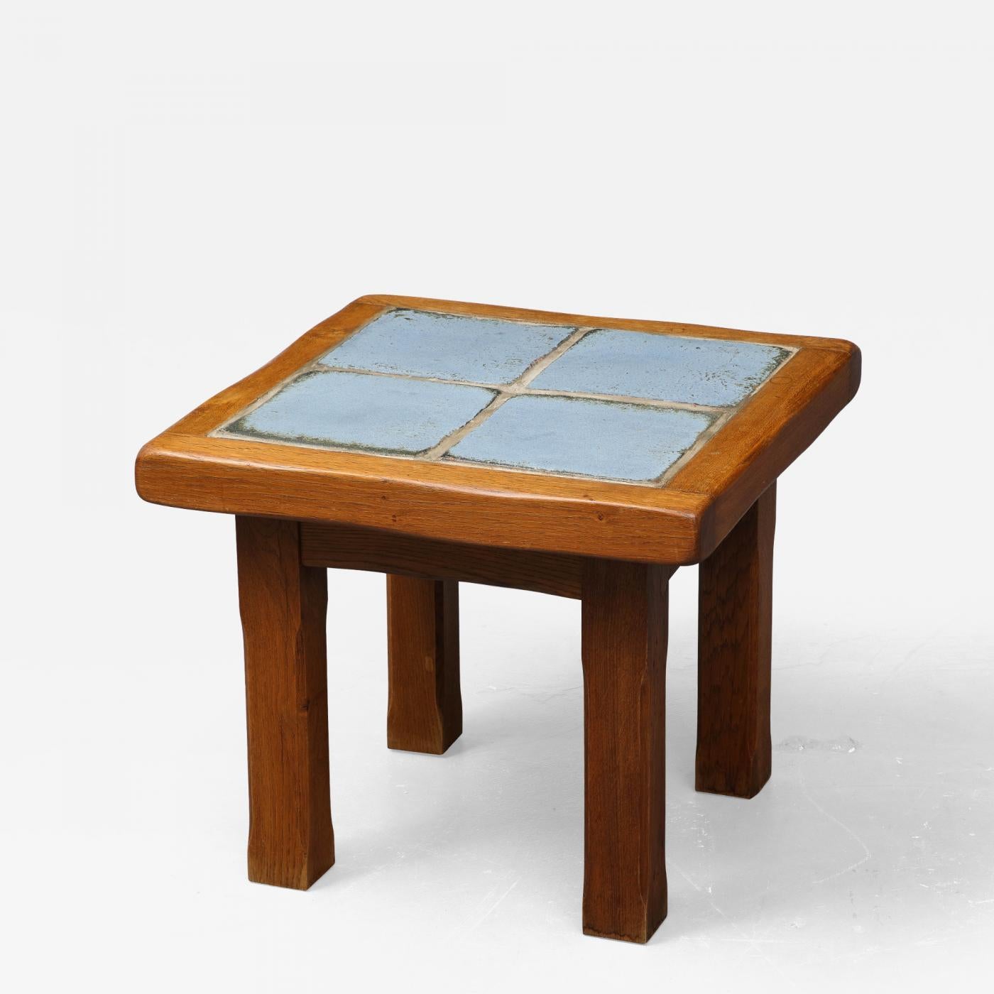 Handmade Elm and Glazed Ceramic tTle Table, France

Beautiful side table with finely crafted details.

