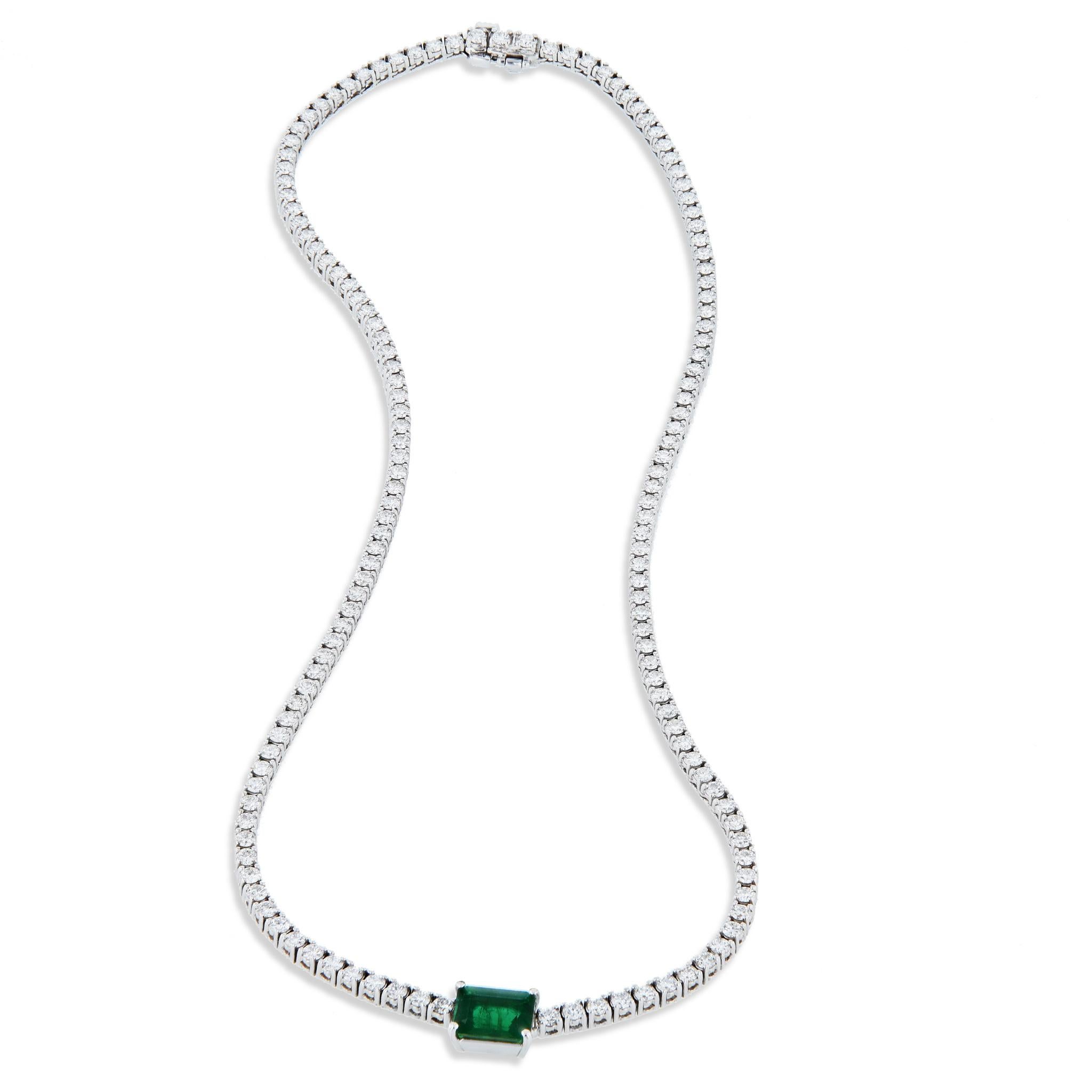 This exquisite emerald cut Zambian emerald diamond tennis necklace features 2.15 carats of emerald cut Zambian emerald 