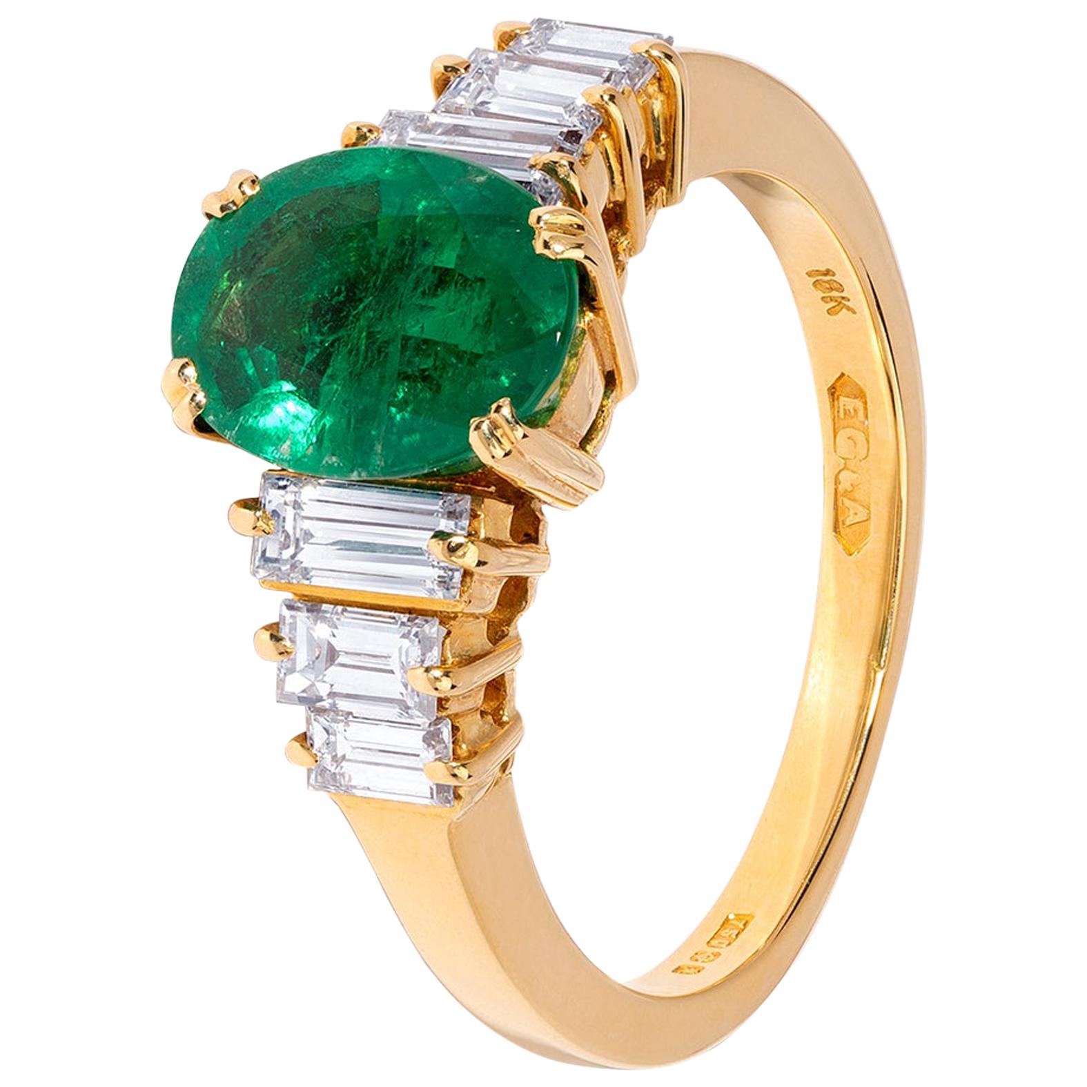 Handmade Emerald Ring with Baguette Diamond Detail in Yellow Gold For Sale