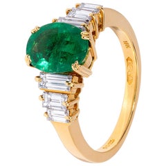 Handmade Emerald Ring with Baguette Diamond Detail in Yellow Gold