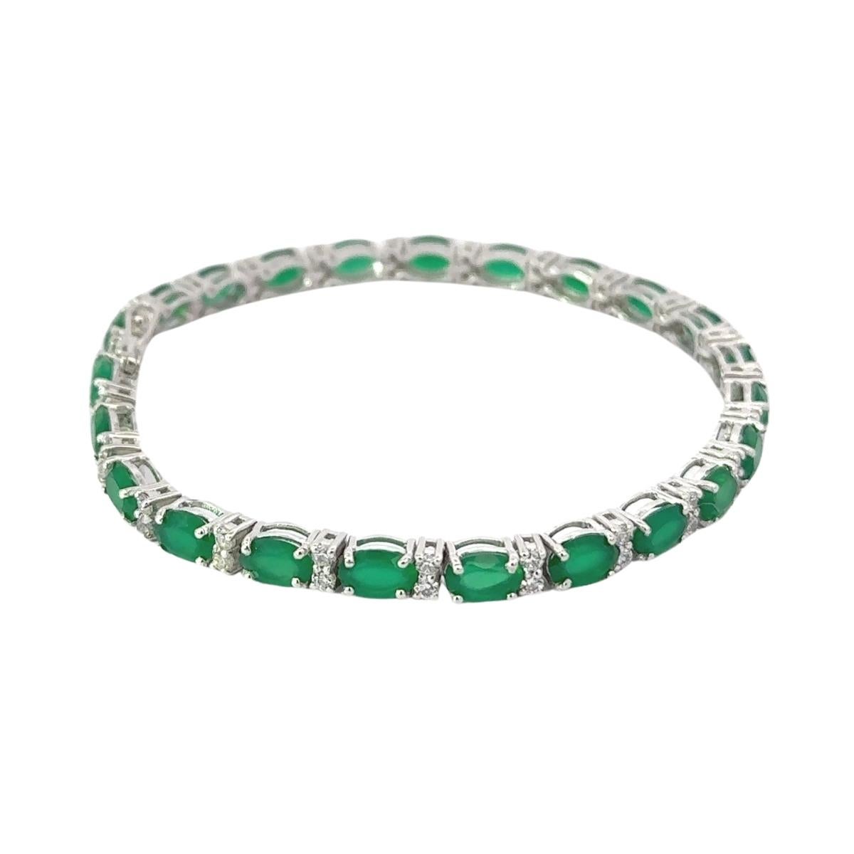 Handmade Emerald & White CZ Tennis Bracelet in 925 Sterling Silver. You shall need statement tennis bracelet to make a statement with your look. Each piece features dazzling cubic zirconia stones, renowned for their brilliance and clarity, set in