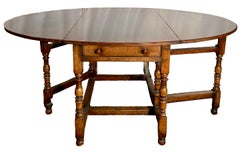 Handmade English Solid Oak Drop-Leaf Dining Table.