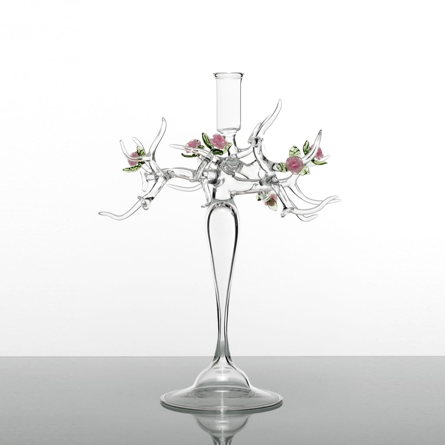 Introducing the Rose Candlestick, a breathtaking hand-blown glass candelabra by the talented Simone Crestani. This exquisite piece features a single candle holder, beautifully designed to elevate your home decor with its enchanting elegance.

The