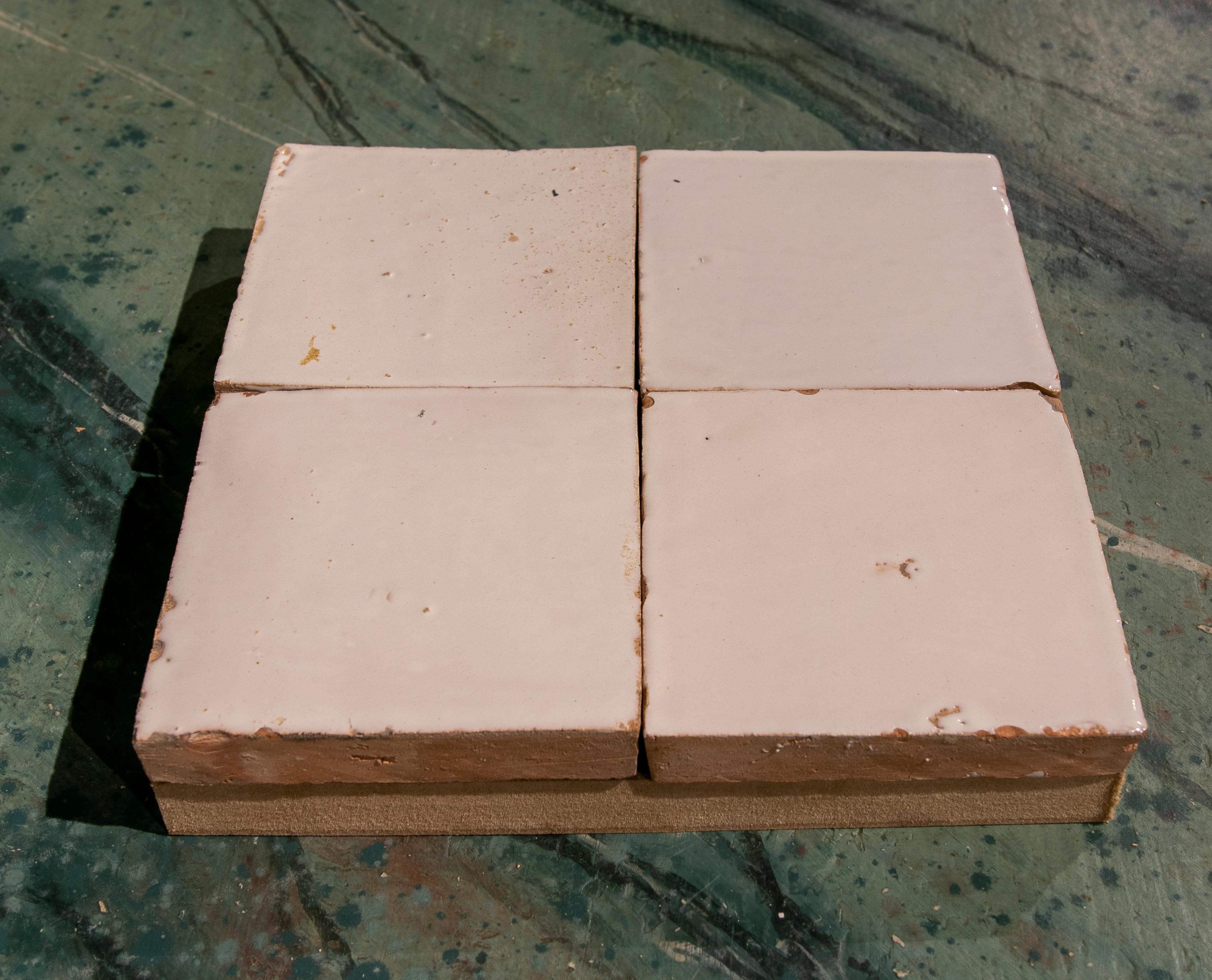 Handmade glazed Zelige tile in white color in size 10x10 cm.

Price per M2 of 175 euro, which corresponds to 100 tiles of 10x10 cm.