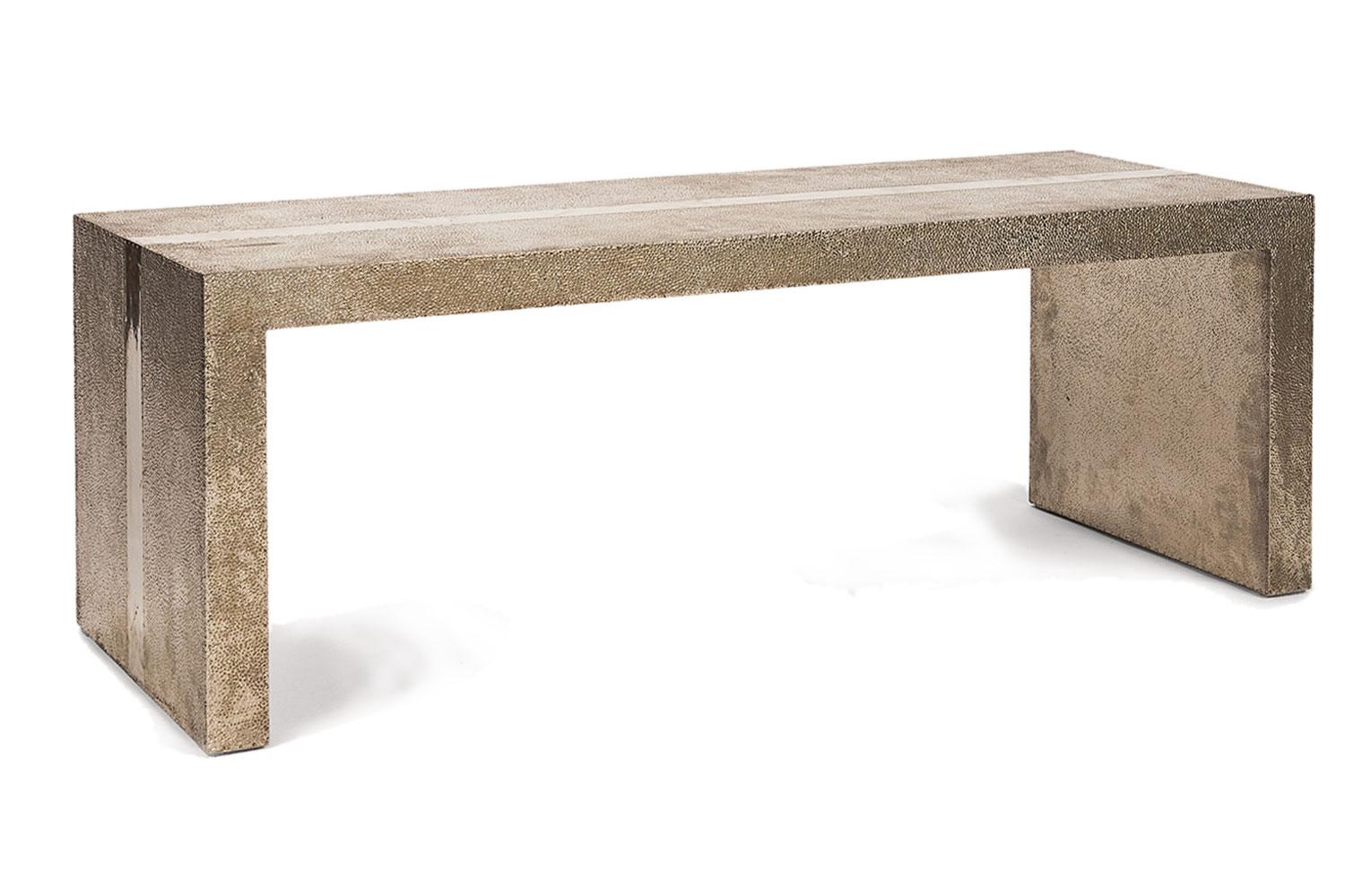 Handmade Hammered White Bronze Alison Spears Bench By Stephanie Odegard

This handmade hammered bench is part of the Stephanie Odegard collection. The surface design is mostly hammered with a contrasting smooth center stripe on the top that echoes