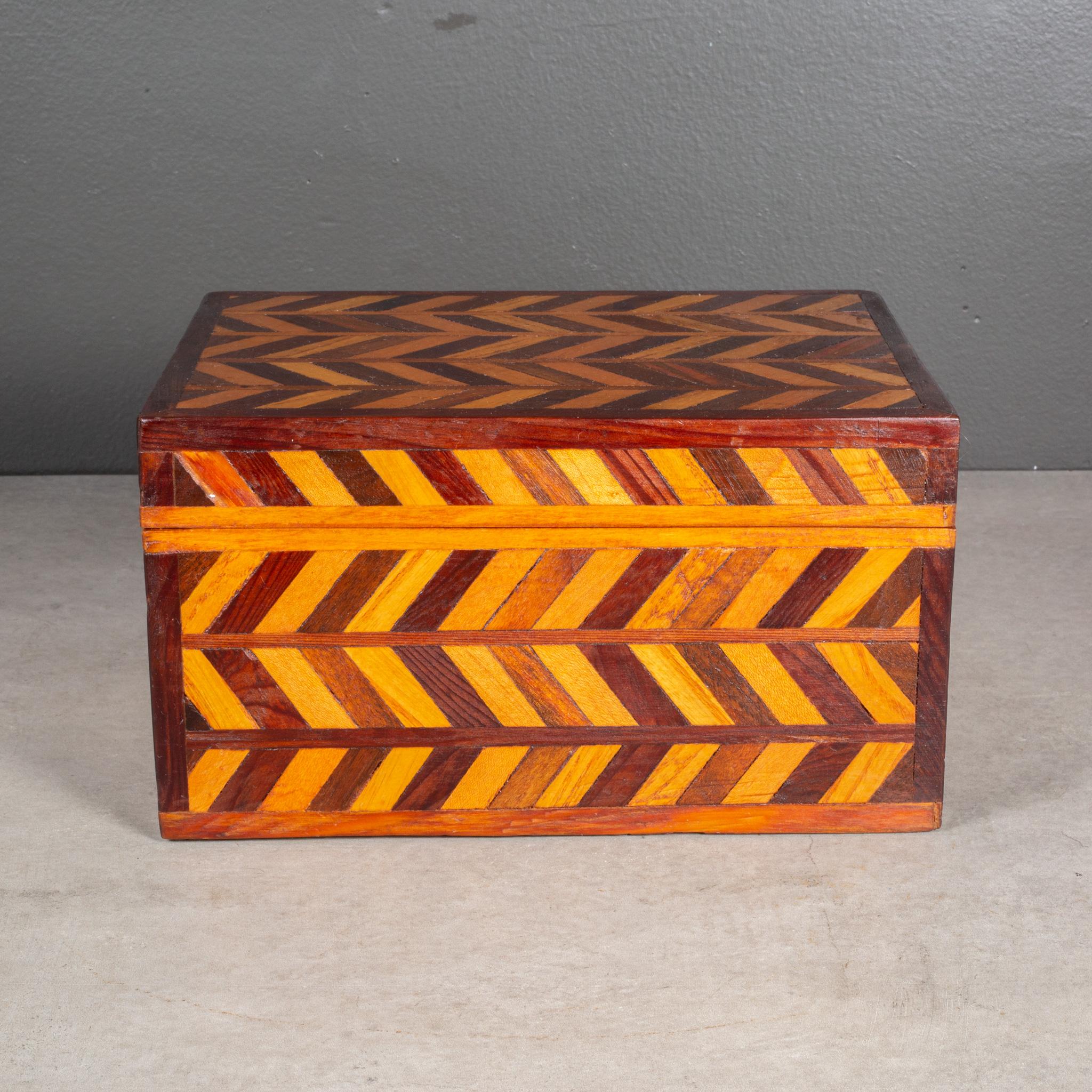 ABOUT

An early 20th century handmade herringbone wooden box with inlay Mahogany, Cherry and Oak veneer.

    CREATOR Unknown.
    DATE OF MANUFACTURE c.1940-1950. 
    MATERIALS AND TECHNIQUES Oak, Cherry, Mahogany Veneer. Laminate inside. 
   