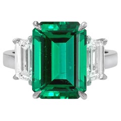 Vintage GIA Certified 7.74 Carat Green Emerald Diamond Platinum Ring
