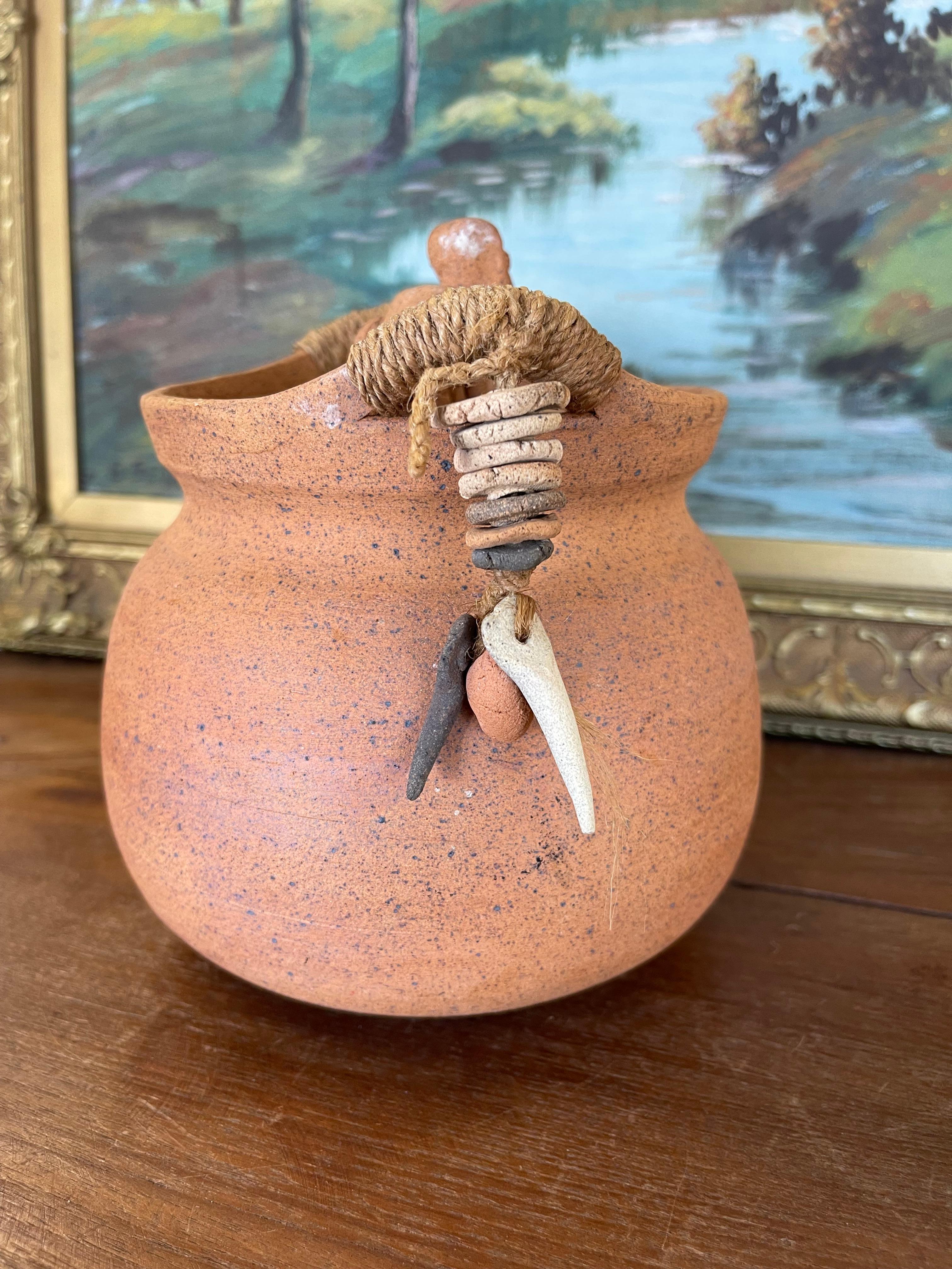 Handmade Indonesian Terracotta Lidded Jar with Beaded Raffia Accents In Good Condition For Sale In Seattle, WA