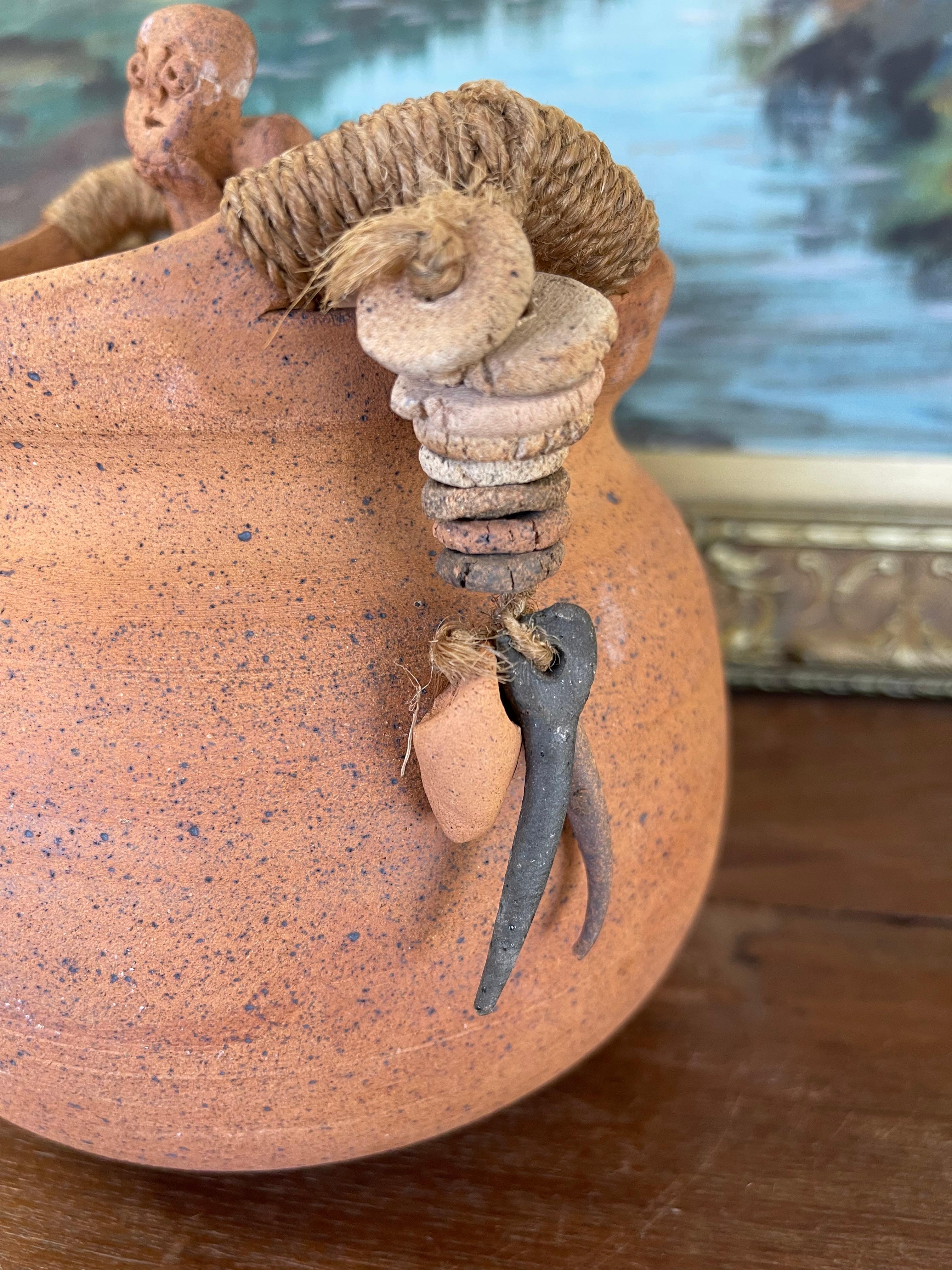 Ceramic Handmade Indonesian Terracotta Lidded Jar with Beaded Raffia Accents For Sale