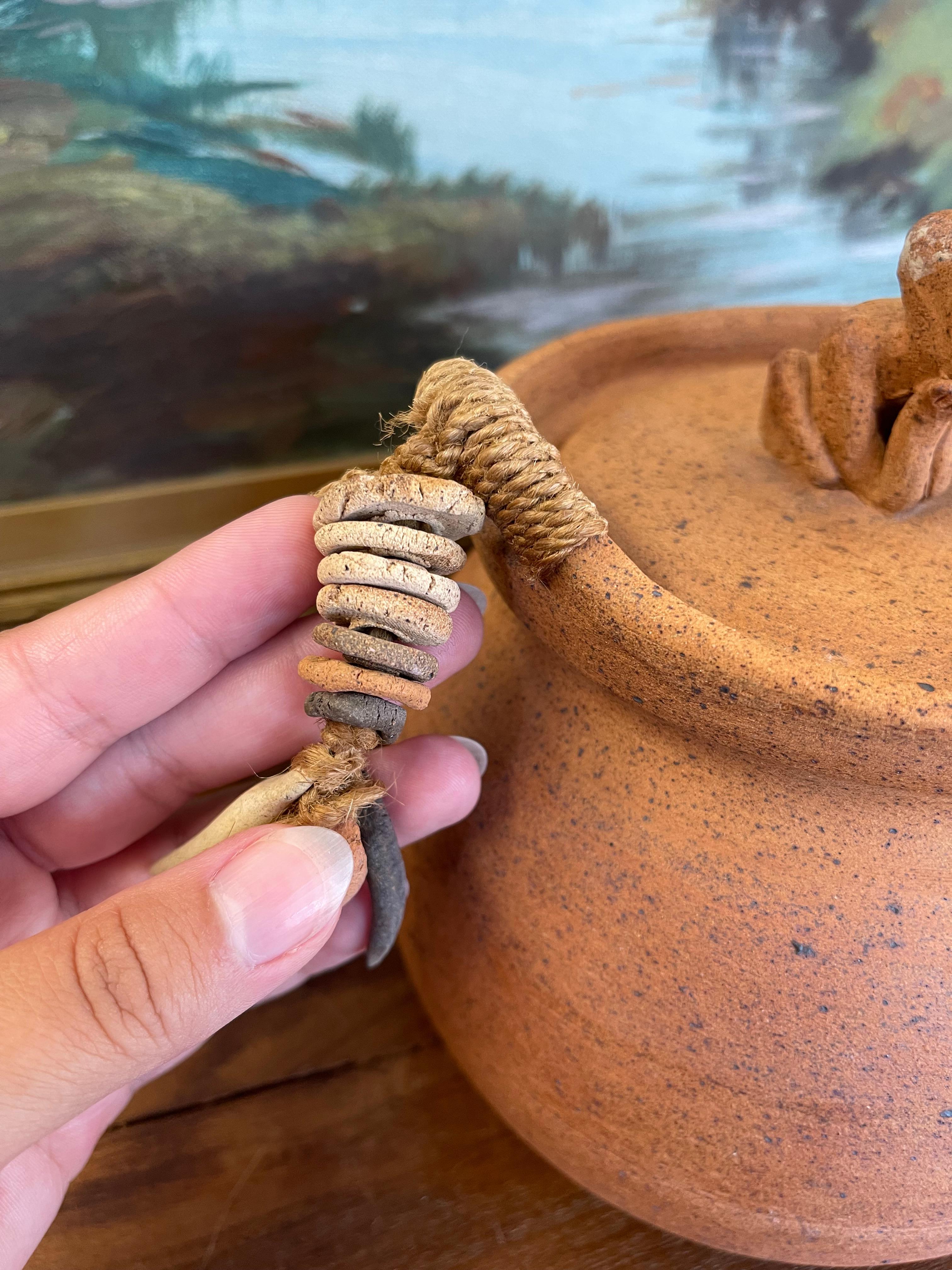 Handmade Indonesian Terracotta Lidded Jar with Beaded Raffia Accents For Sale 1