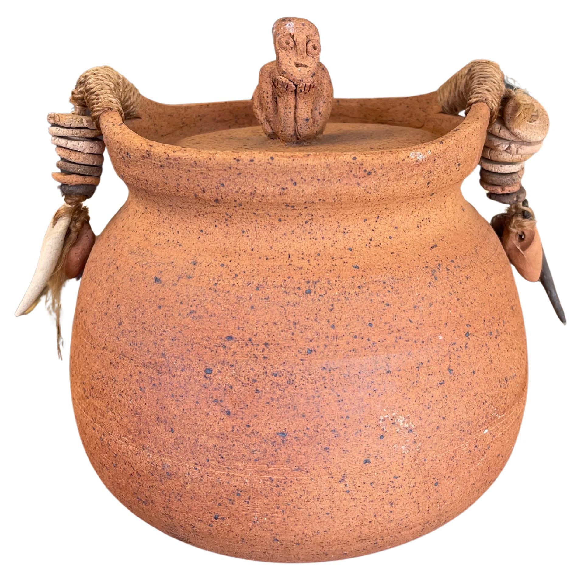 Handmade Indonesian Terracotta Lidded Jar with Beaded Raffia Accents For Sale
