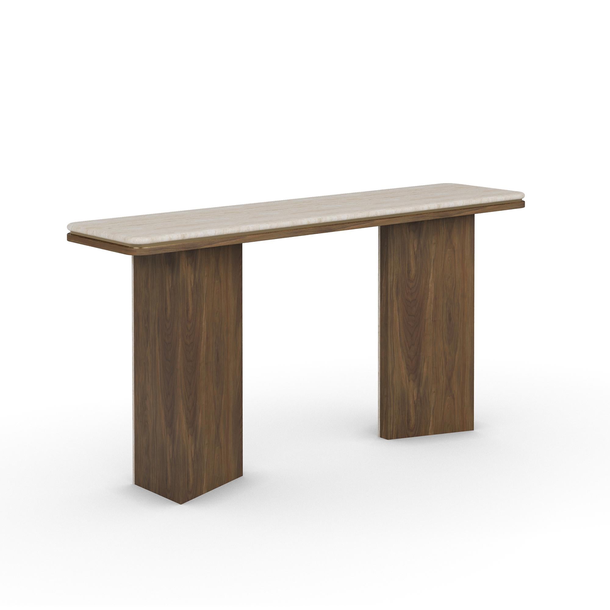The Isa Console Table from Nolita Harbour is a refined fusion of organic textures and architectural elegance, thoughtfully designed to bring a sophisticated presence to any interior. Its sleek travertine tabletop showcases the natural beauty of the