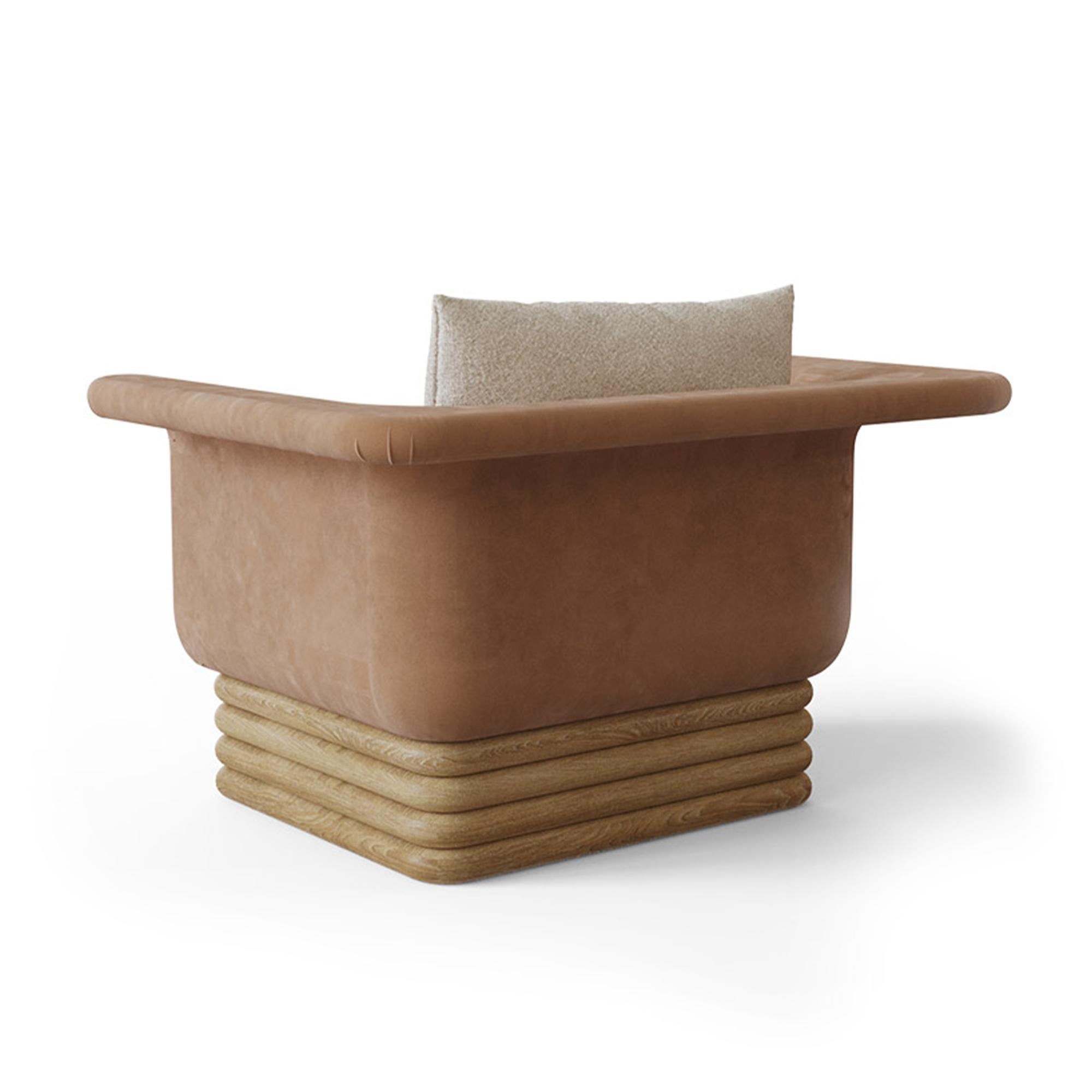 Nolita Harbour Isabella Armchair, a perfect blend of contemporary design and luxurious comfort. This exquisitely crafted armchair features a unique structure that combines premium velvet and boucle fabrics with a robust oak base. The Isabella