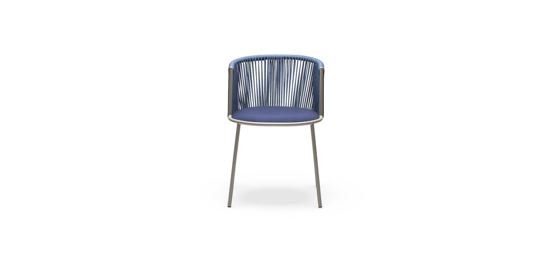Powder-coated metal frame in anthracite for outdoor use 
Handmade woven back with marine rope. 
Upholstered seat in midnight blue fabric for outdoor use.
Dimensions:
Width: 53 cm - 21 in
Height: 76 cm - 30 in
Seat height: 49 cm - 19 in
Armrest