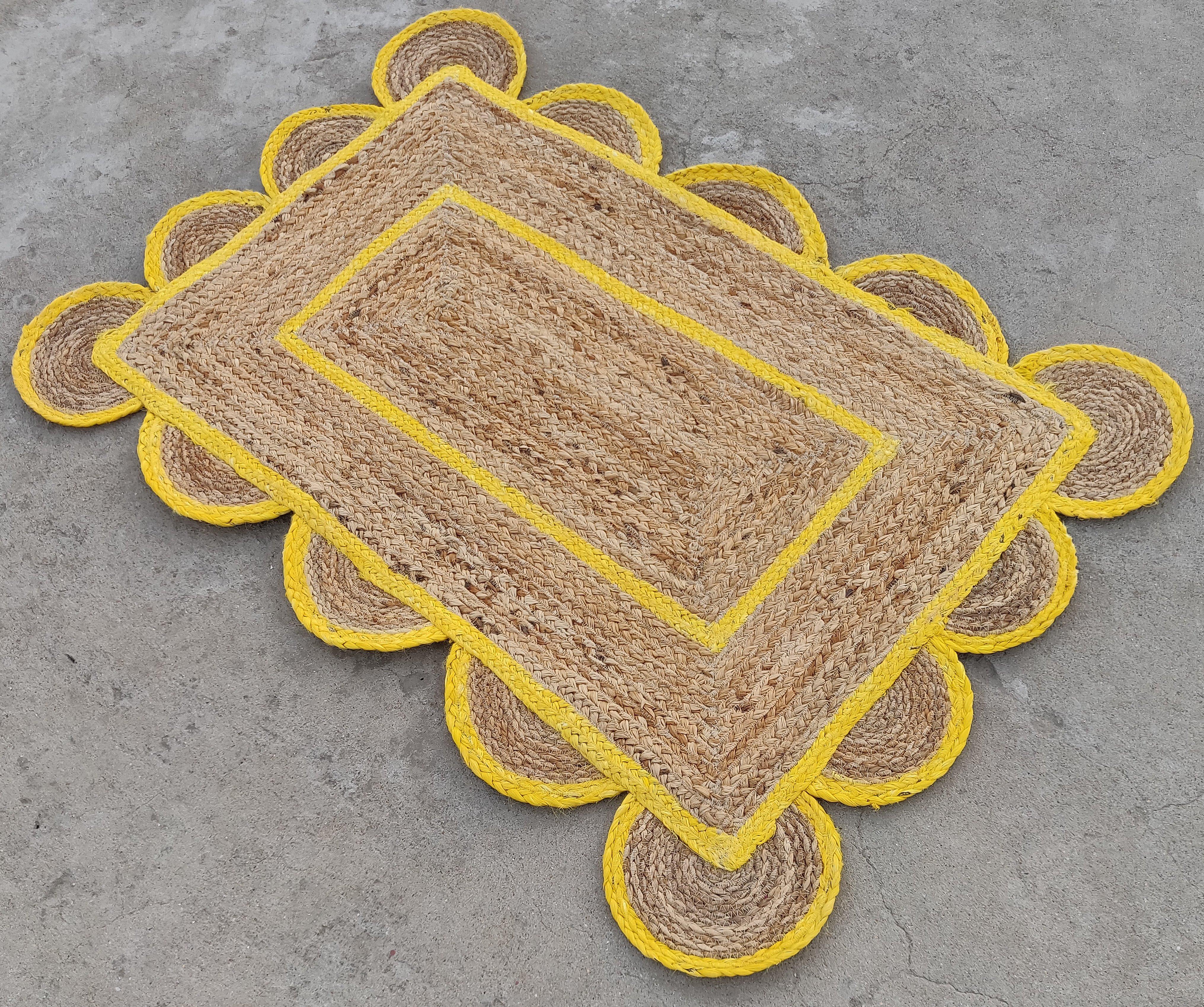 Handmade Jute Scalloped Rug, Natural Jute Dhurrie with Yellow Border -2'x3'

These special flat-weave dhurries are hand-woven with 15 ply 100% cotton yarn. Due to the special manufacturing techniques used to create our rugs, the size and color of