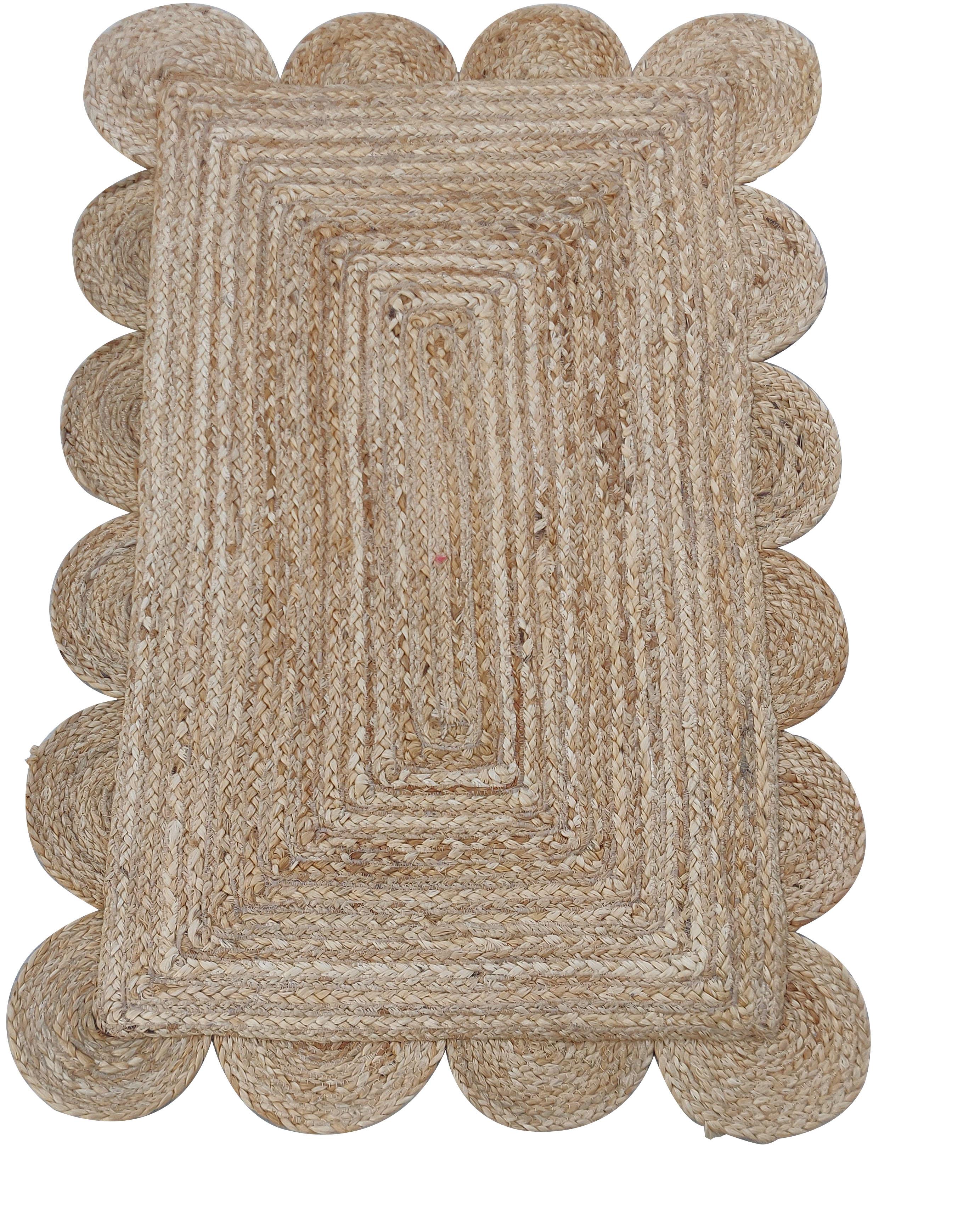 Handmade Jute Scalloped Rug, Natural Jute Dhurrie -2'x3'

These special flat-weave dhurries are hand-woven with 15 ply 100% cotton yarn. Due to the special manufacturing techniques used to create our rugs, the size and color of each piece may vary a