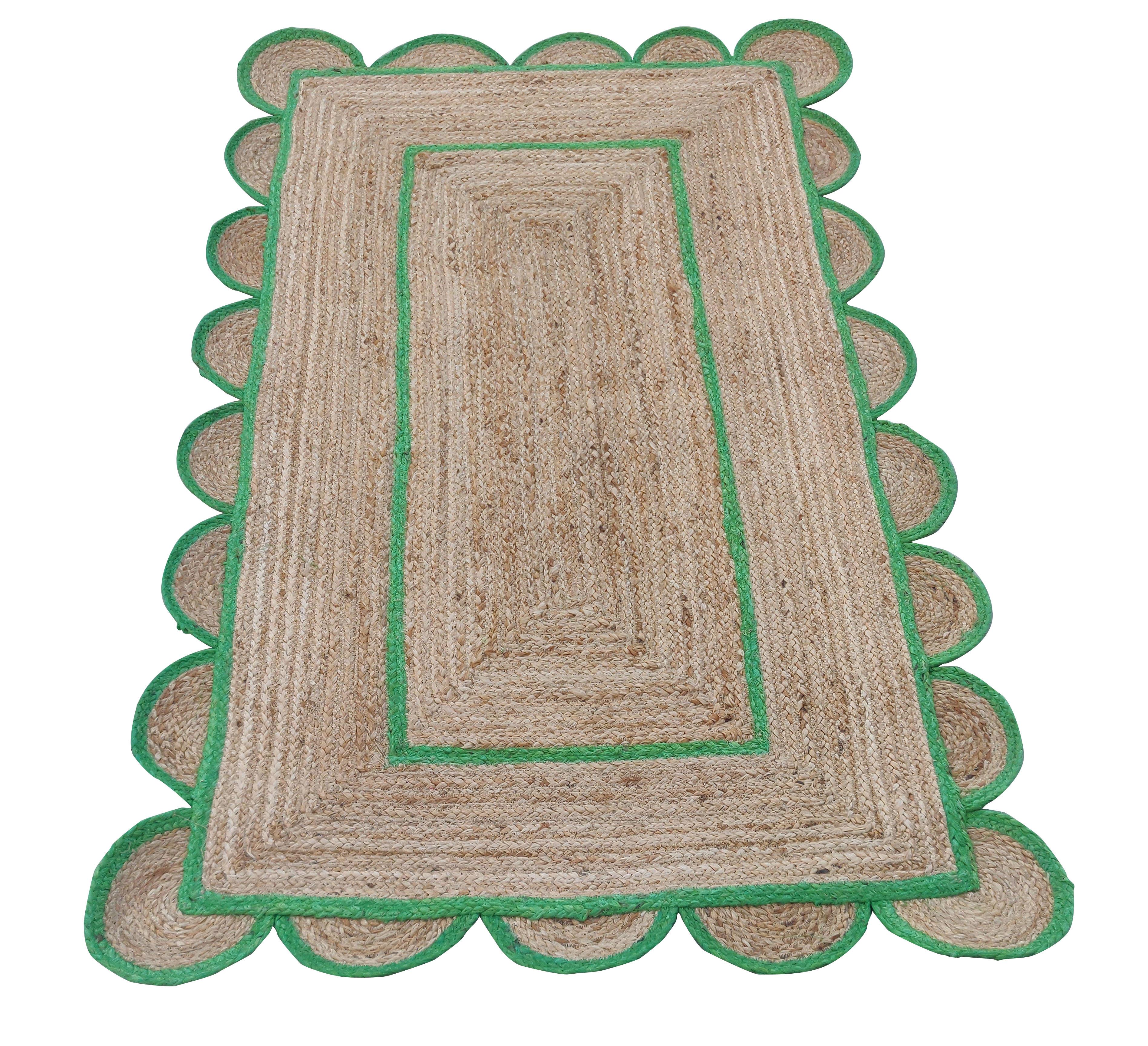 Handmade Jute Scalloped Rug, Natural Jute and Green Dhurrie -3'x5'

These special flat-weave dhurries are hand-woven with 15 ply 100% cotton yarn. Due to the special manufacturing techniques used to create our rugs, the size and color of each piece