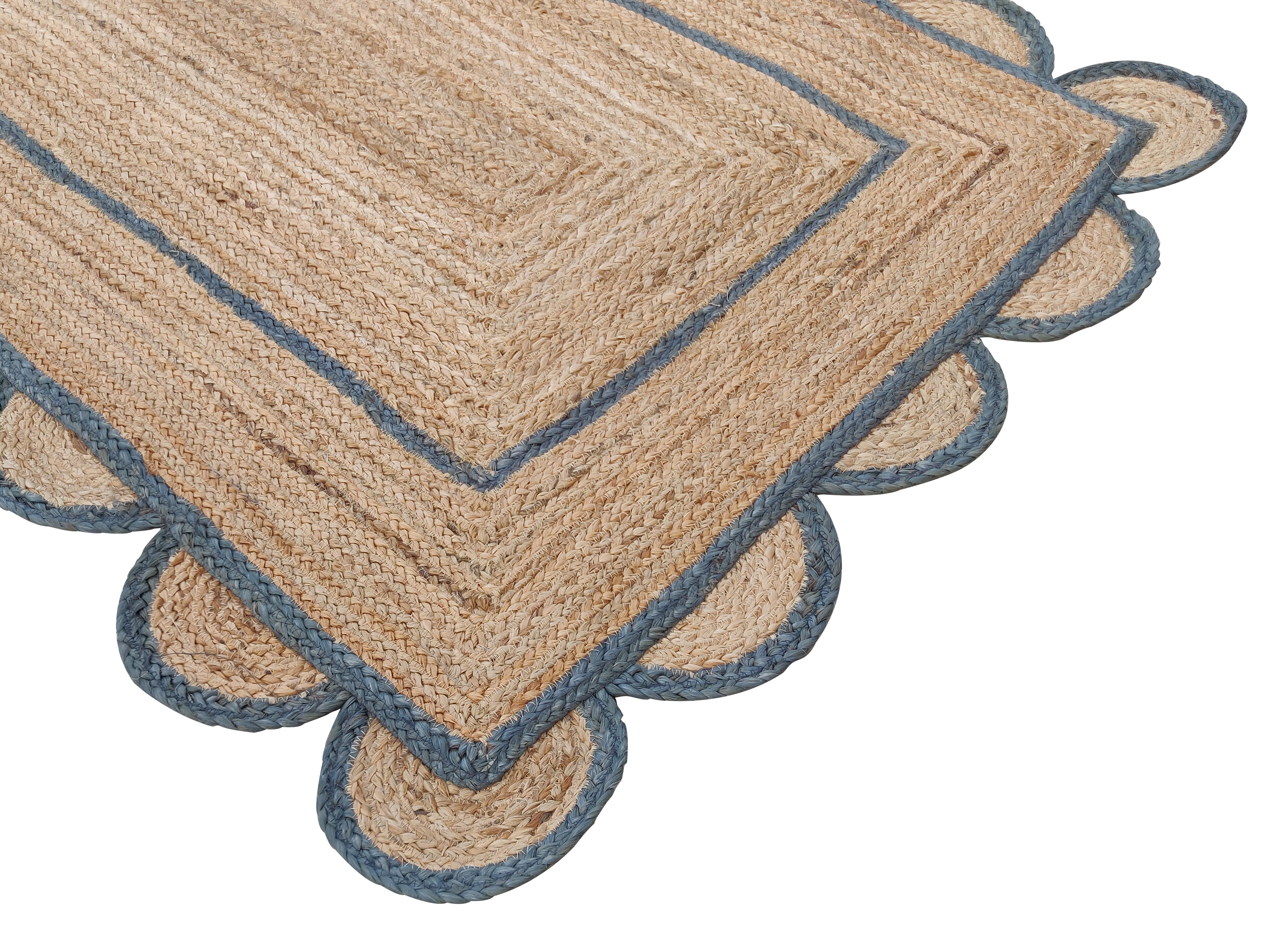 Handmade Jute Scalloped Rug, Grey And Natural Jute Dhurrie -4'x6'

These special flat-weave dhurries are hand-woven with 15 ply 100% cotton yarn. Due to the special manufacturing techniques used to create our rugs, the size and color of each piece