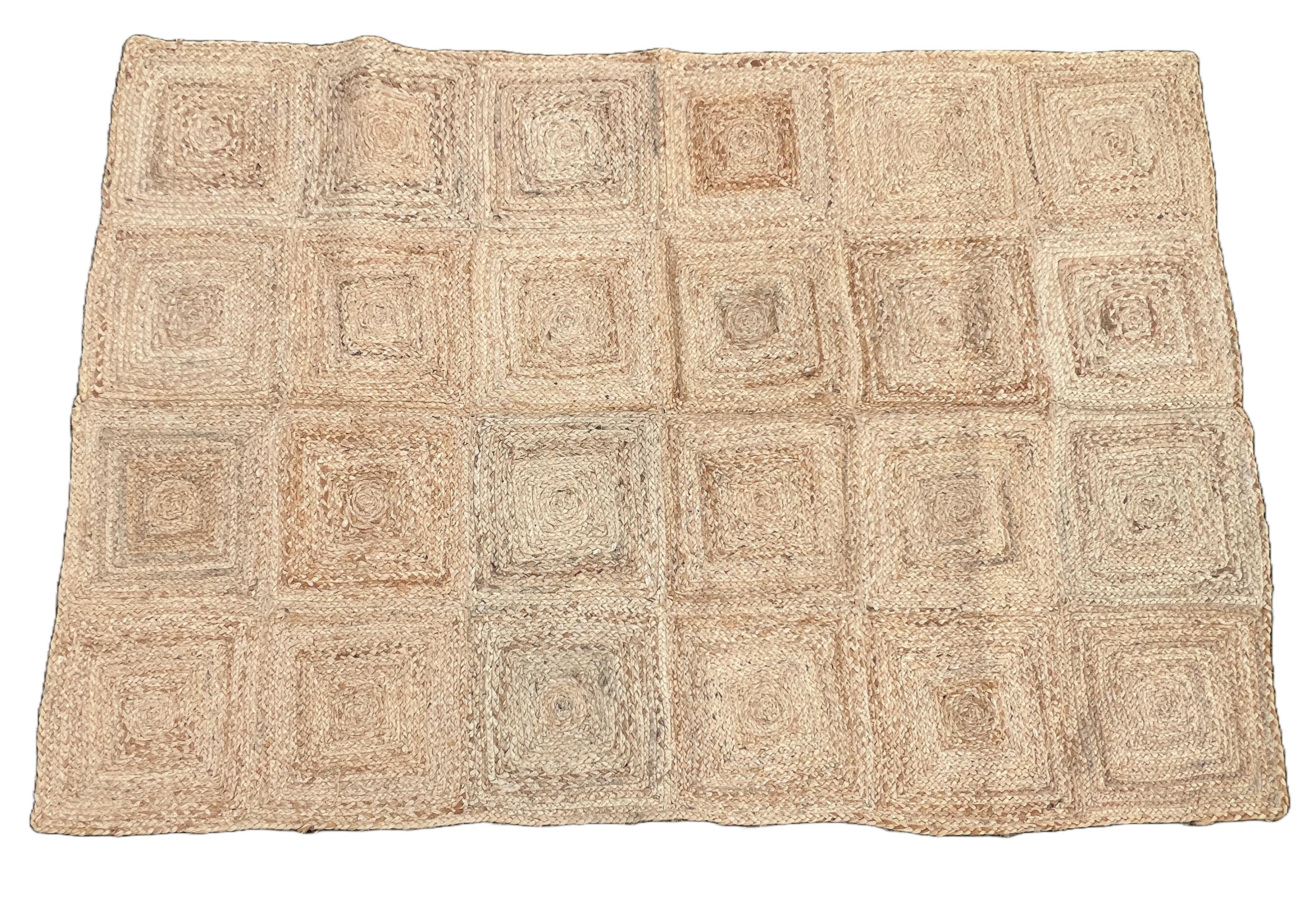 Handmade Jute Checked Rug, Natural Jute Dhurrie -4'x6'

These special flat-weave dhurries are hand-woven with 15 ply 100% cotton yarn. Due to the special manufacturing techniques used to create our rugs, the size and color of each piece may vary a